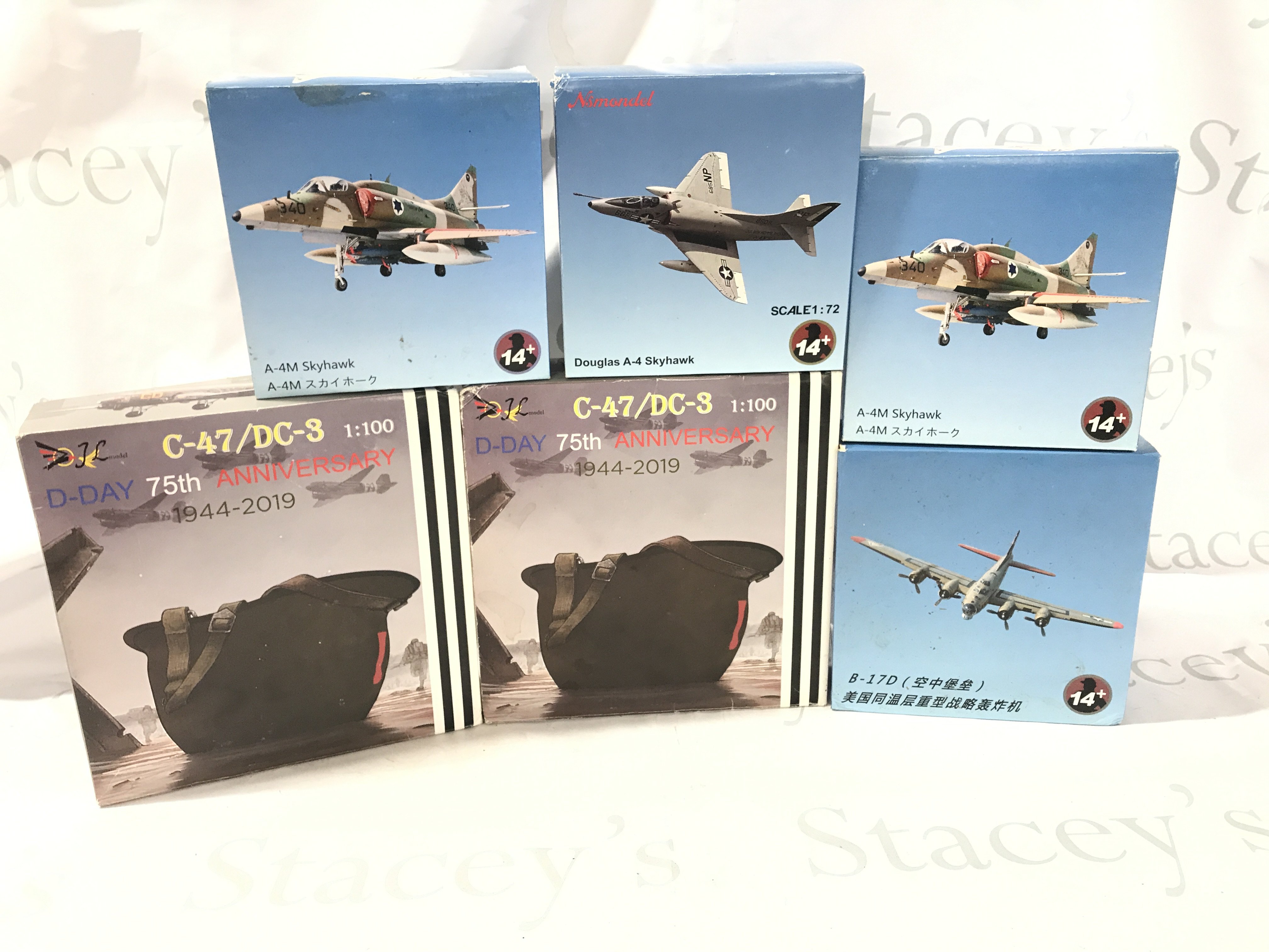 A box containing a quantity of scale model aircraft. No Reserve.