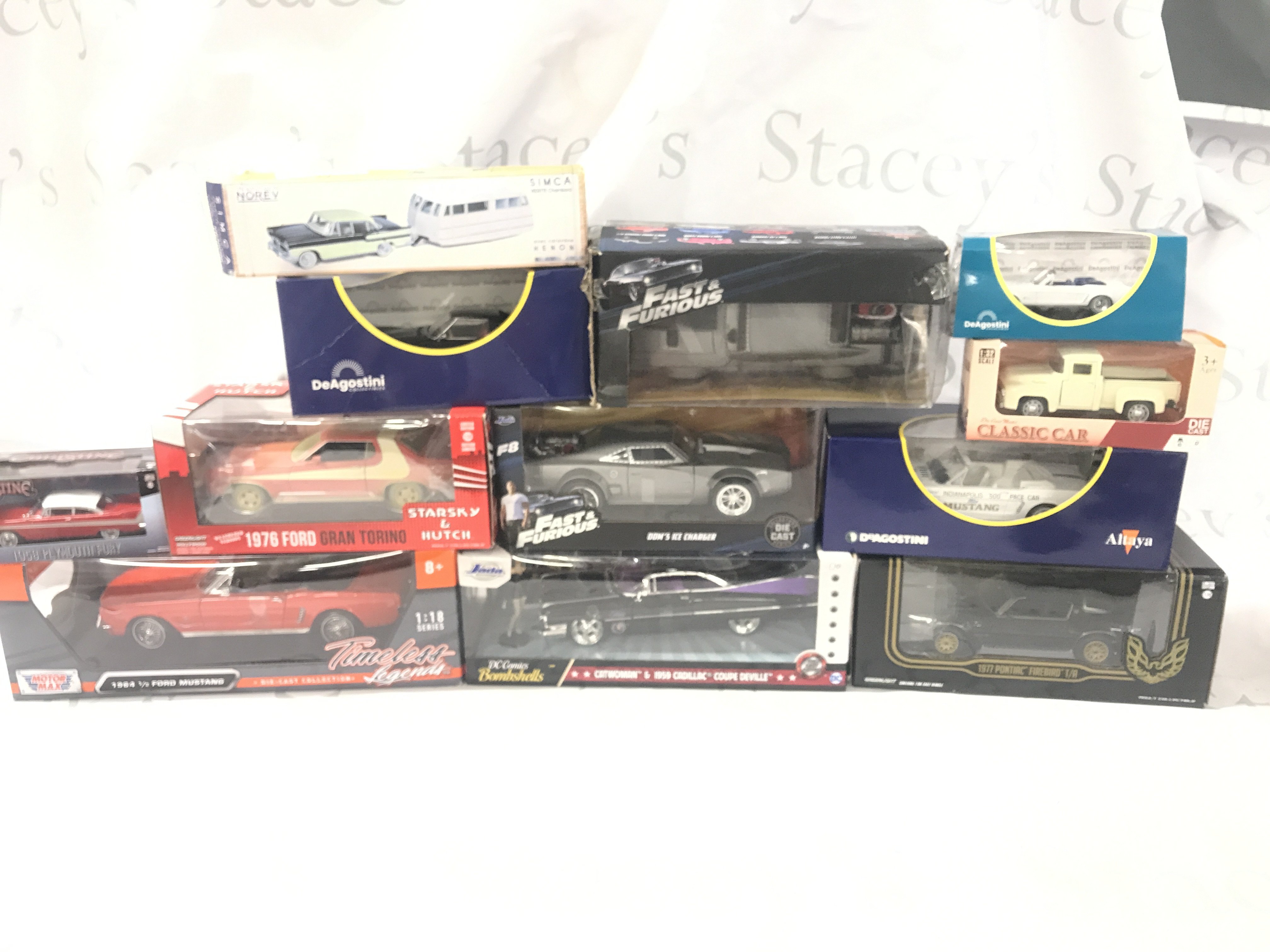 A box containing various model cars as pictured. No Reserve.