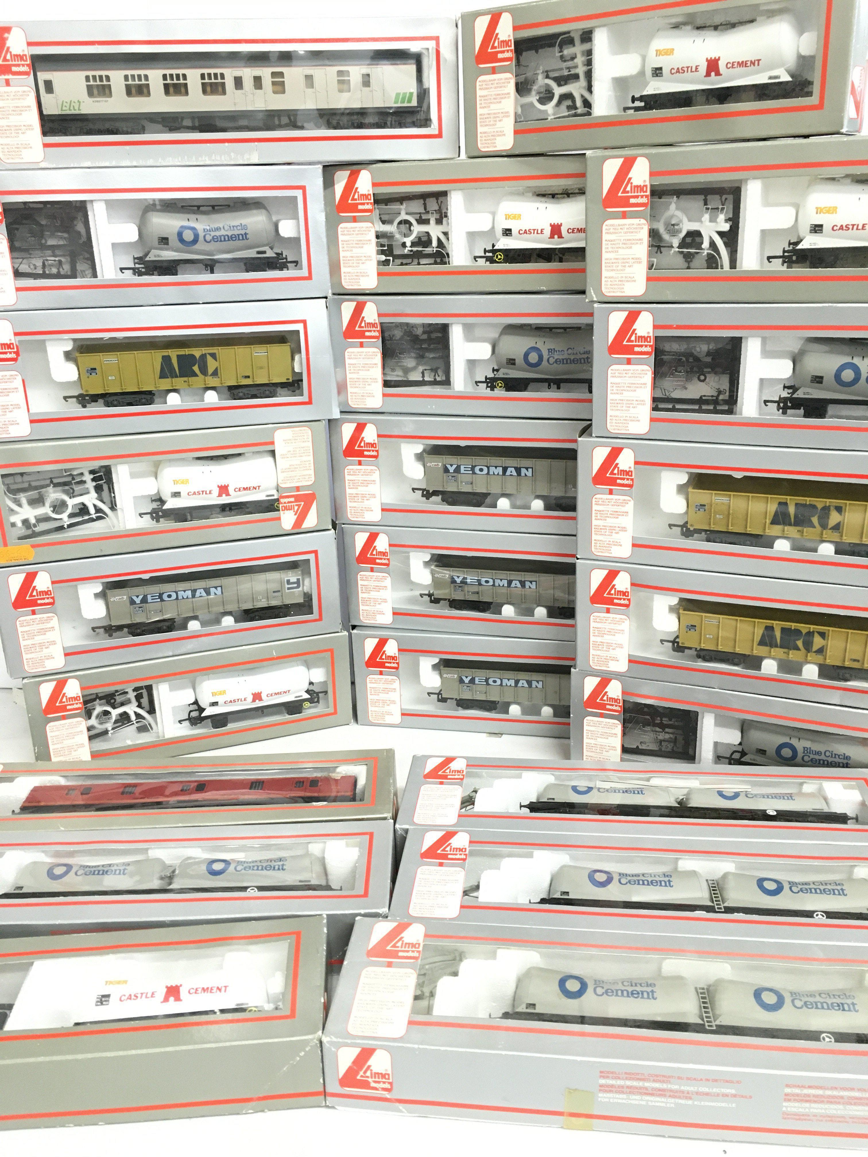 A Collection Of Boxed Lima 00 Gauge Wagons. Coaches Etc.