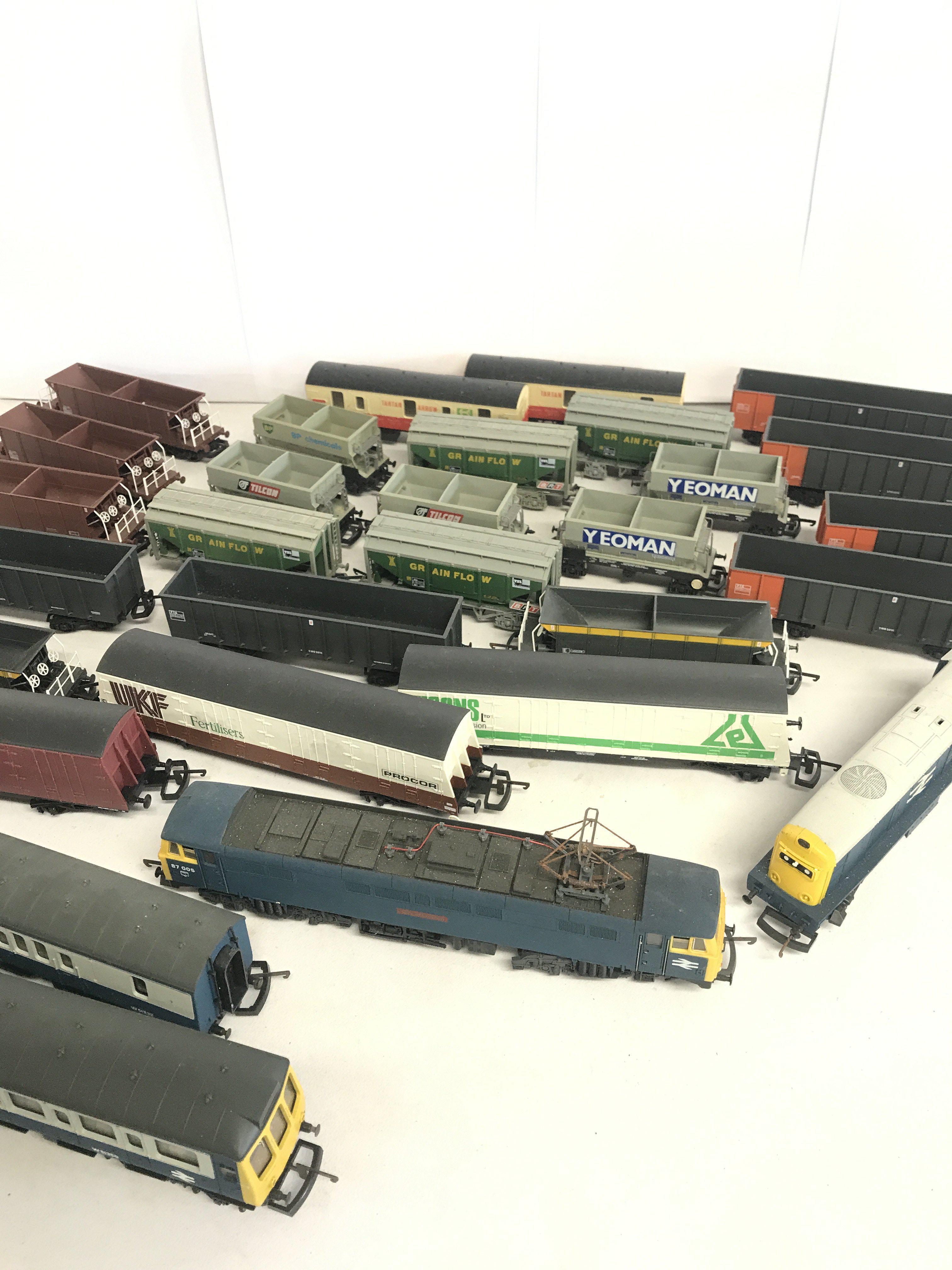 11 Lima 00 Gauge Locomotives And a Collection of Rolling Stock And Coaches.