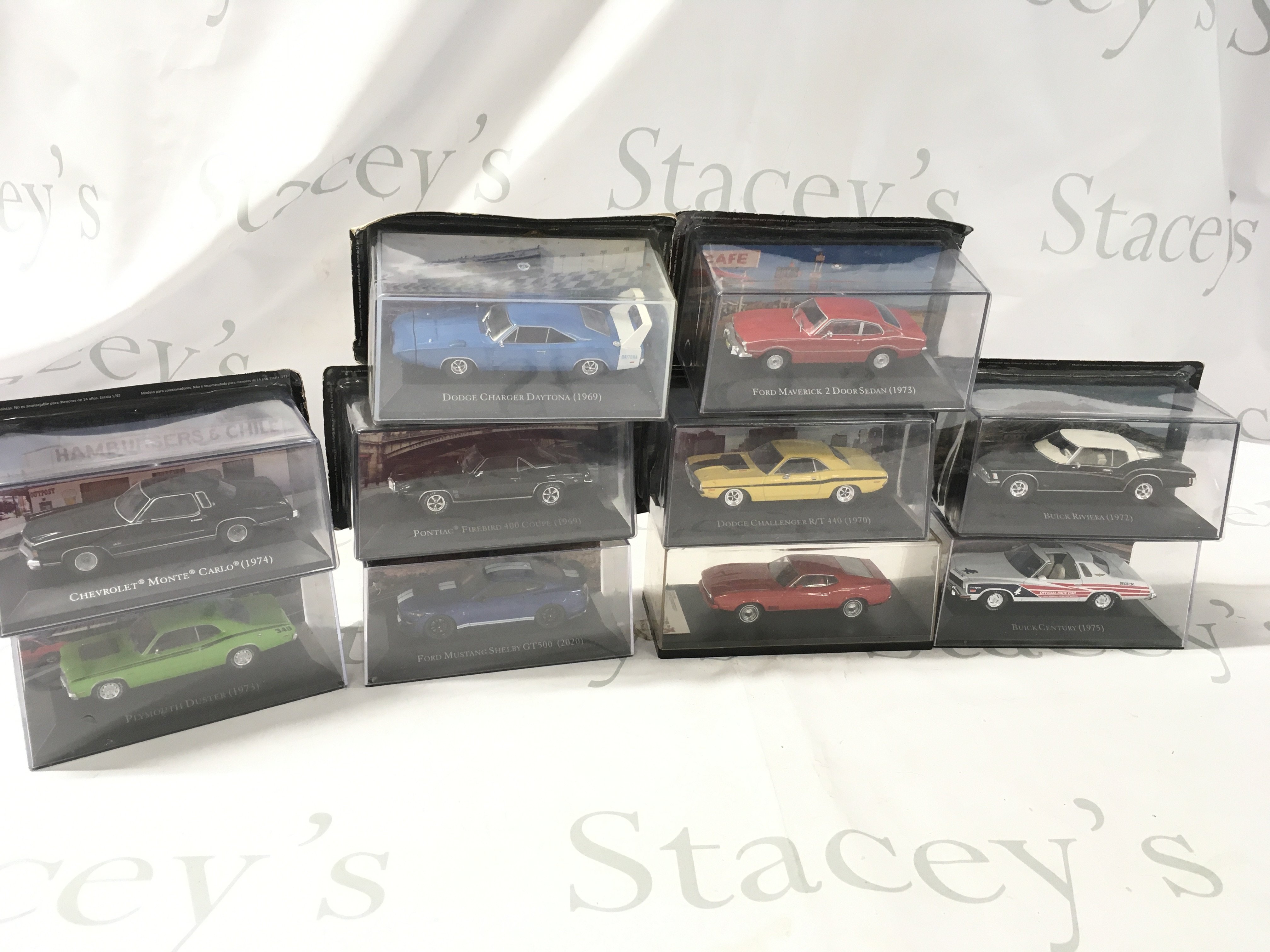 A collection of boxed model diecast featuring American cars by various manufacturers. Mostly unopened. No reserve