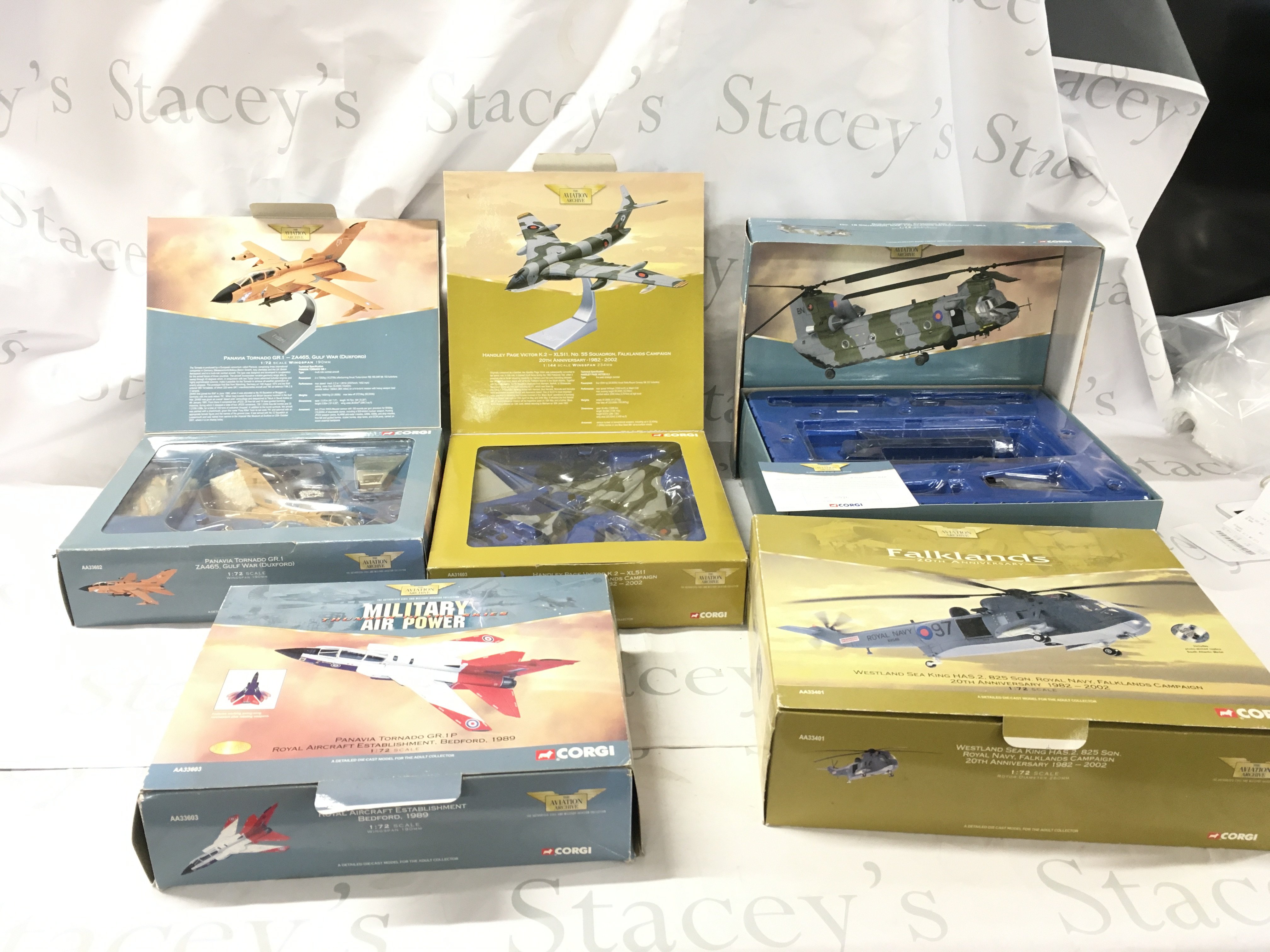 A collection of boxed Corgi Aviation Archive model featuring AA33602 Tornado gulf war&hellip;.AA31603 Handley Page Victor&hellip;AA34202 Chernook ltd edition&hellip;.AA33401Sea King&hellip;.AA33603 Tornado. No reserve