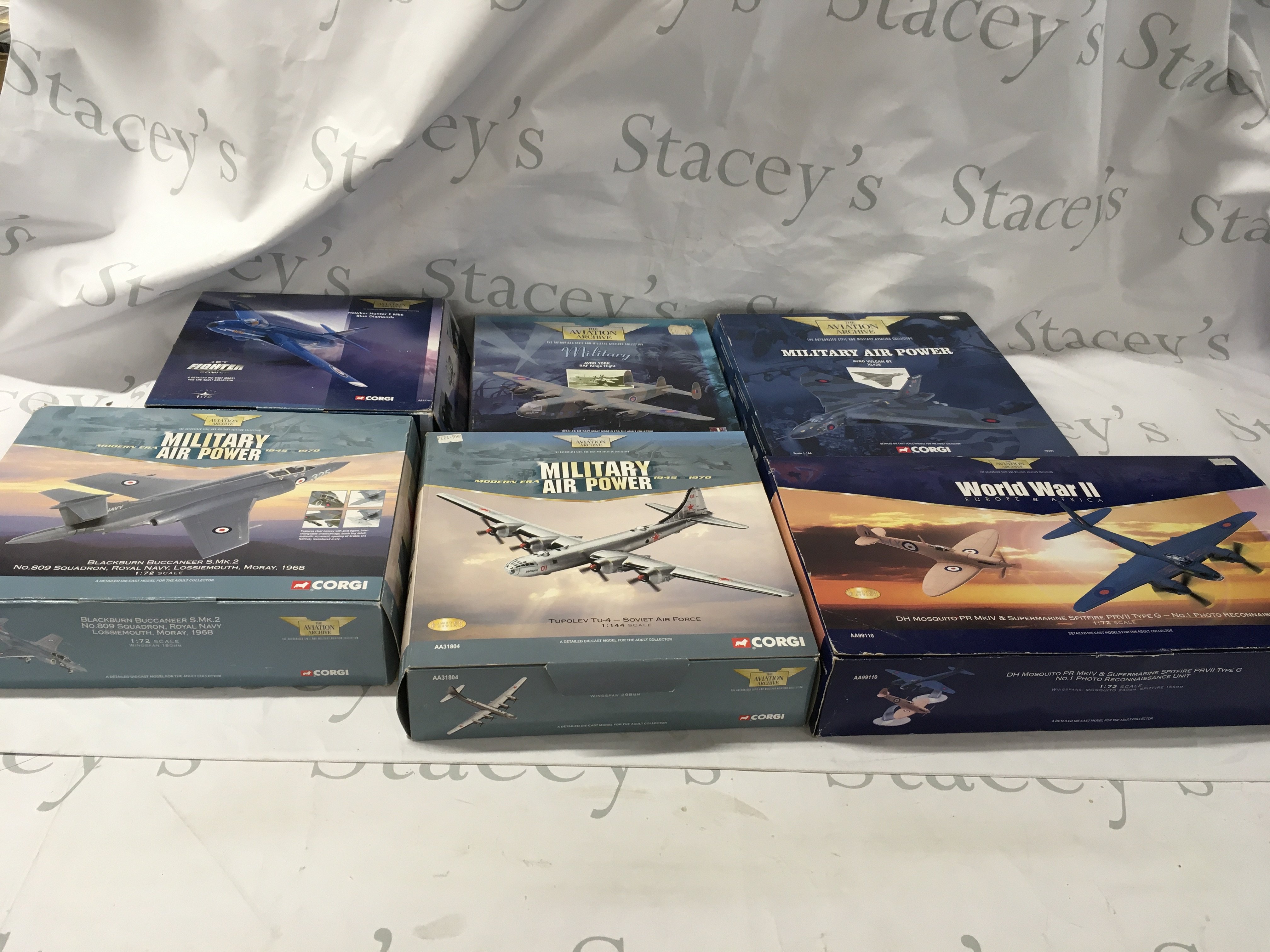 A collection of boxed Corgi Aviation Archive model planes featuring AA32701 Hawker Hunter&hellip;AA34101 Buccaneer&hellip;AA31804 Tupolev Tu4&hellip;AA99110 Spitfire and Mosquito&hellip;48305 Vulcan&hellip;47204 Avro York. No reserve