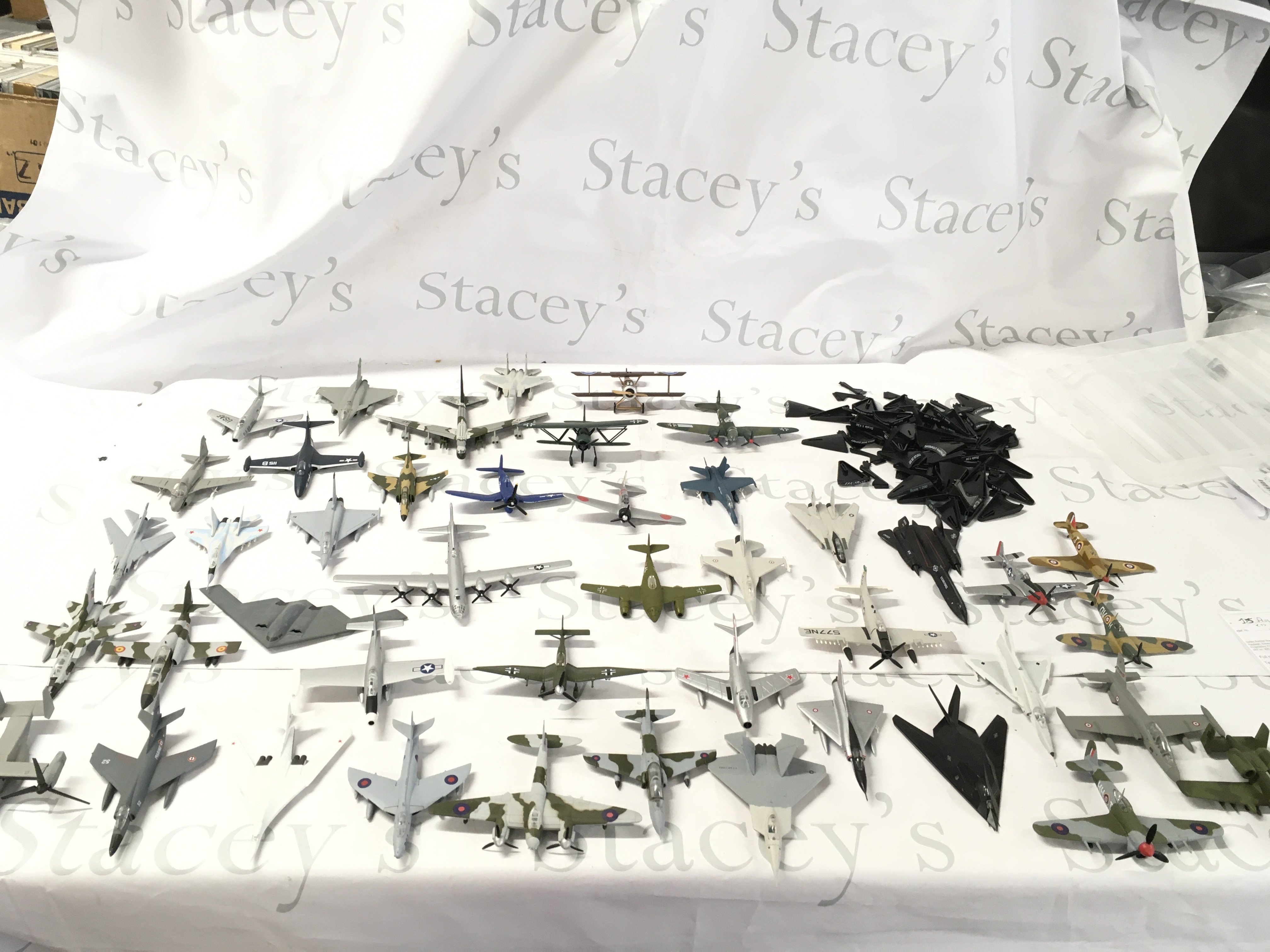 A collection in excess of 40 metal model military planes. Stands included. No reserve