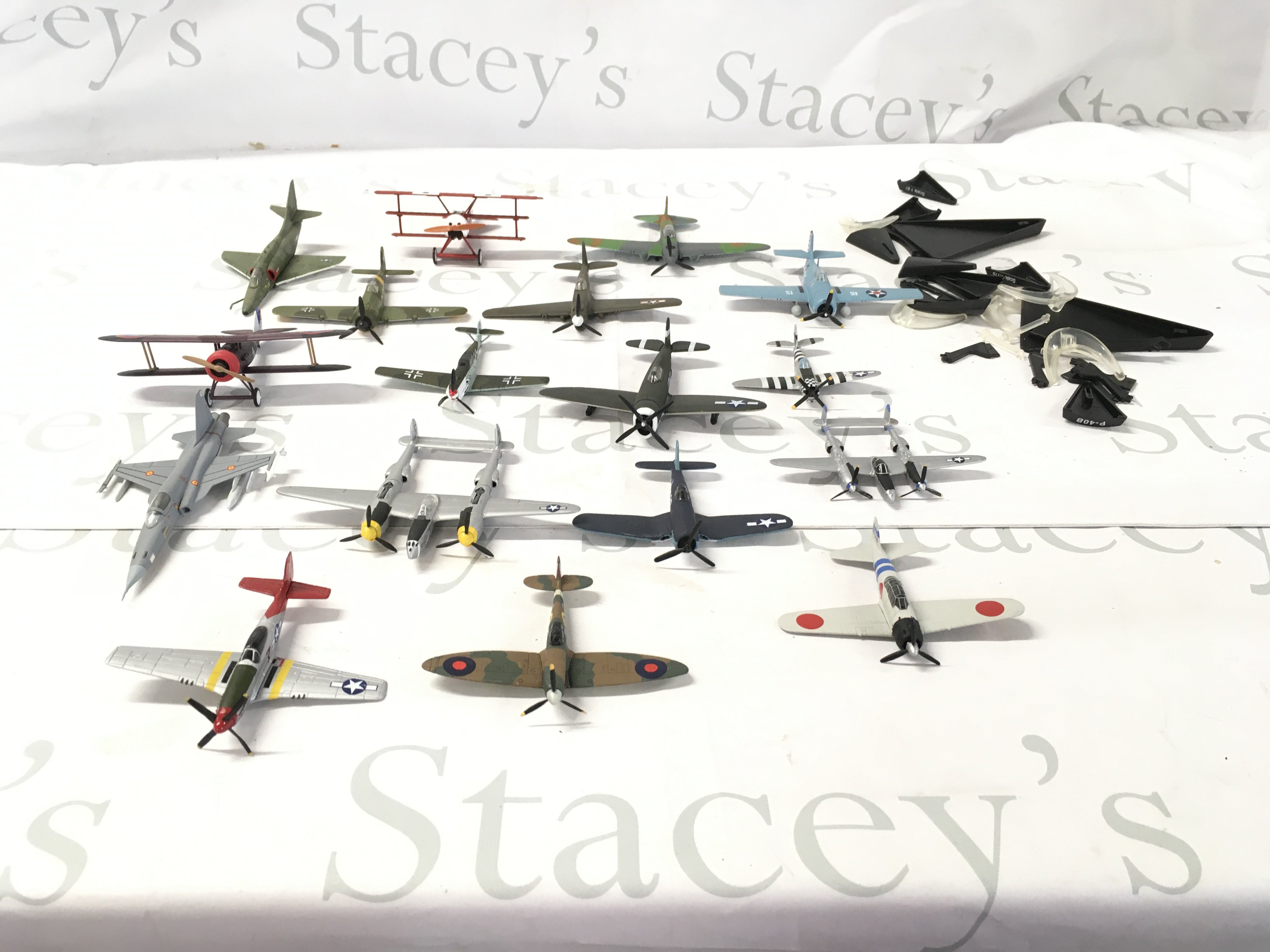 A small collection of metal model military aircraft. Stands included. No reserve.