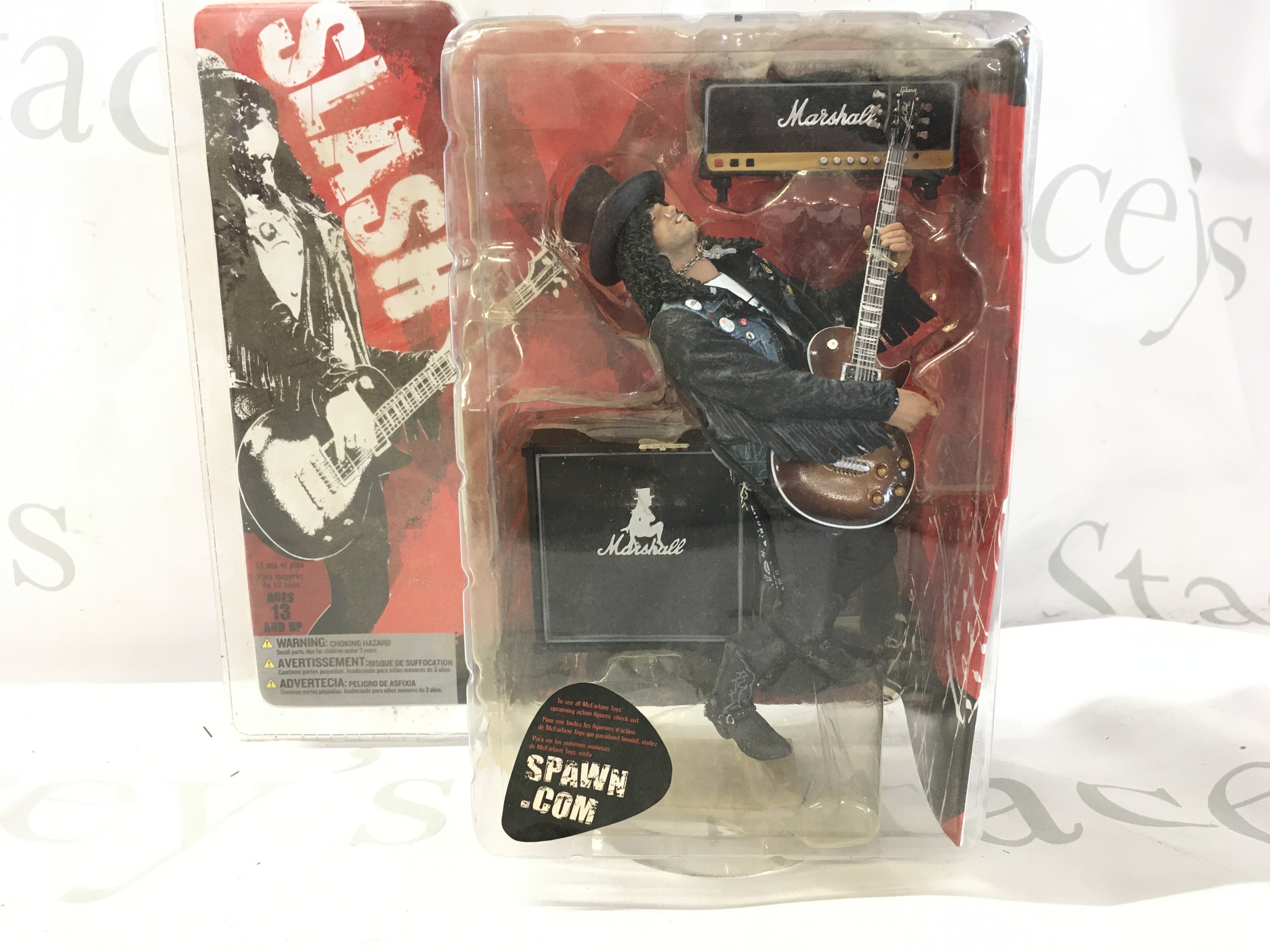 A sealed unopened Slash action figure by McFarlane TOS.