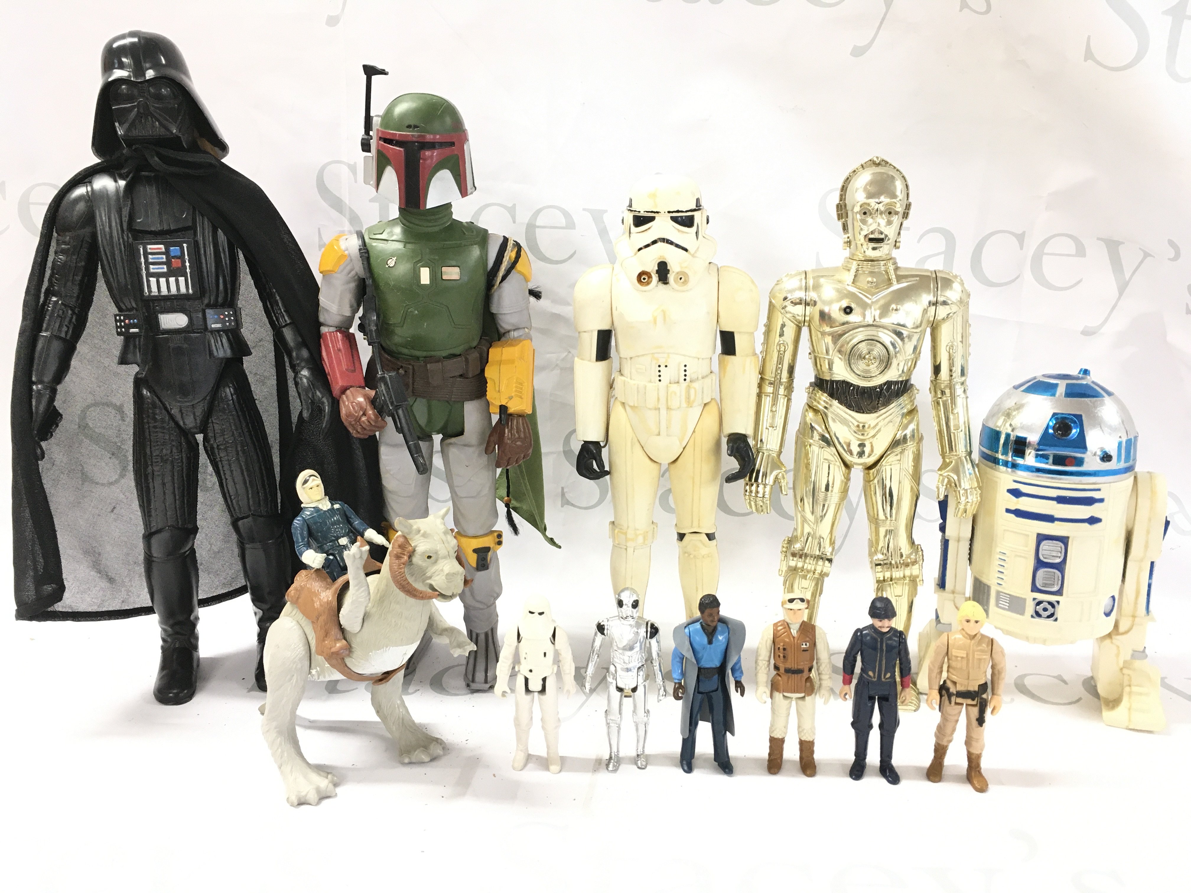 A Collection of Vintage Star Wars Figures including 12 inch Figures.