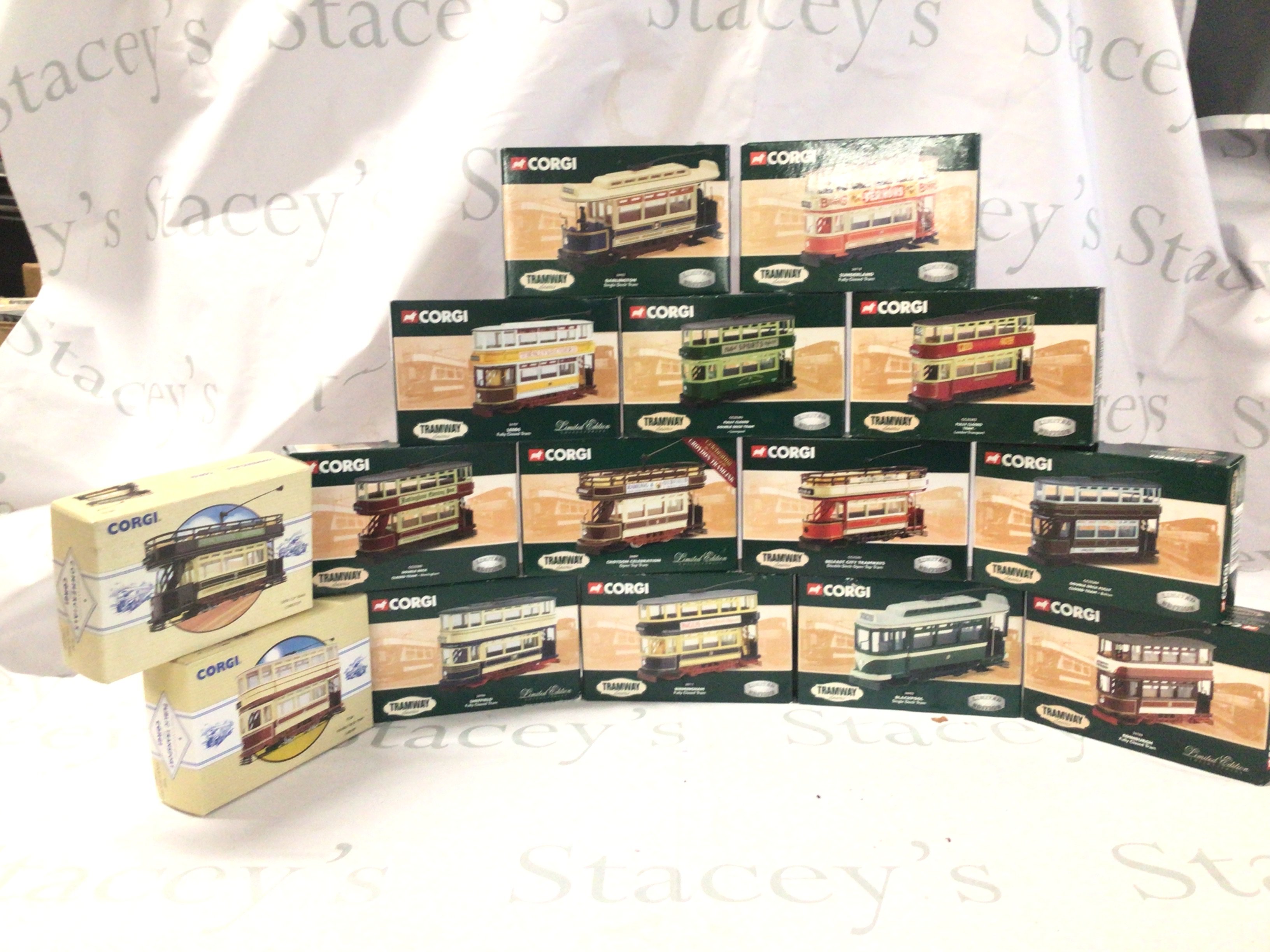 A collection of 15 boxed diecast model trams by Corgi mostly Tramway Classic series.