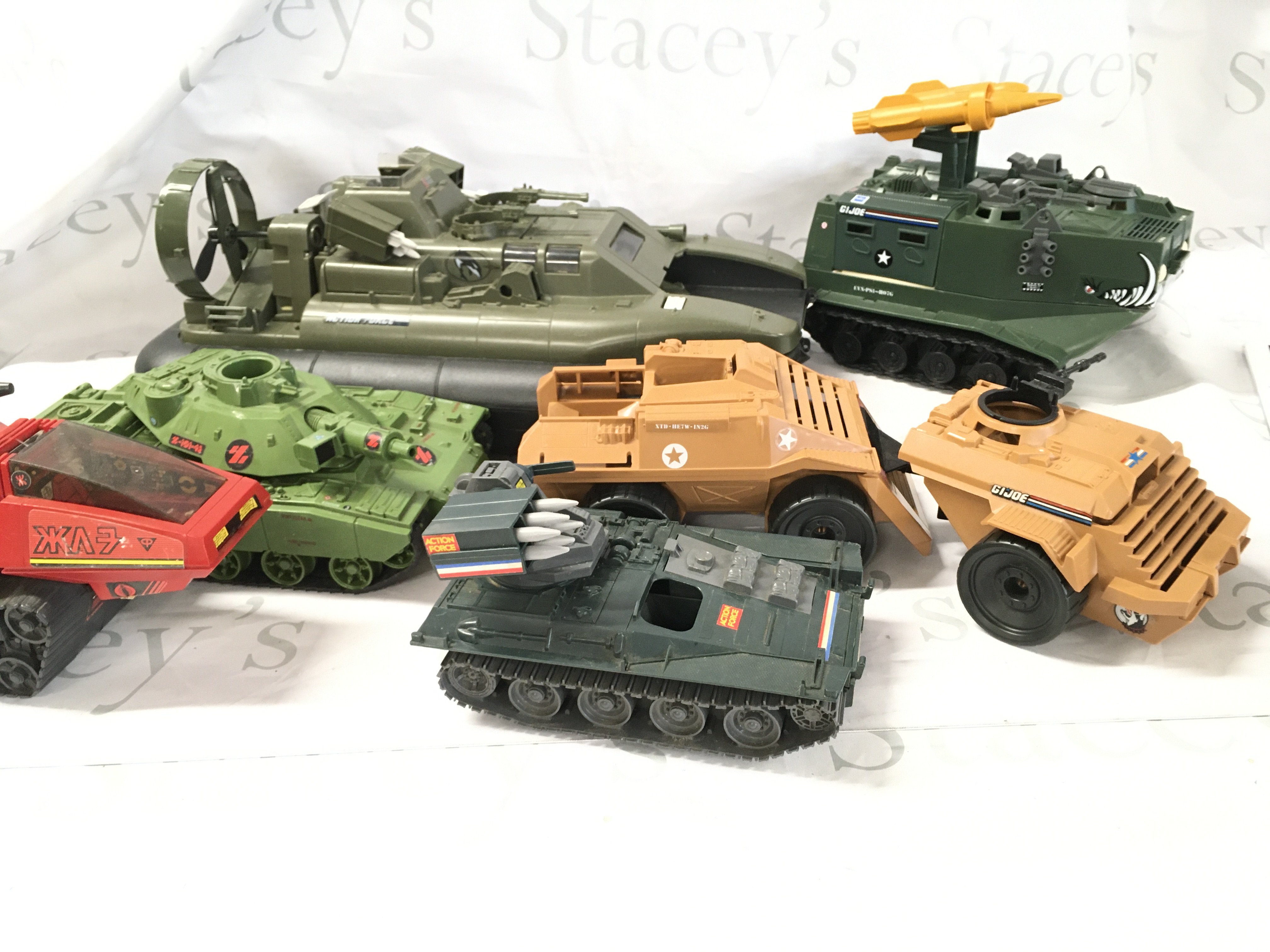 A Box Containing G.I. Joe/Action Force Vehicles with Some Figures. Ideal for spare Parts.No Reserve.