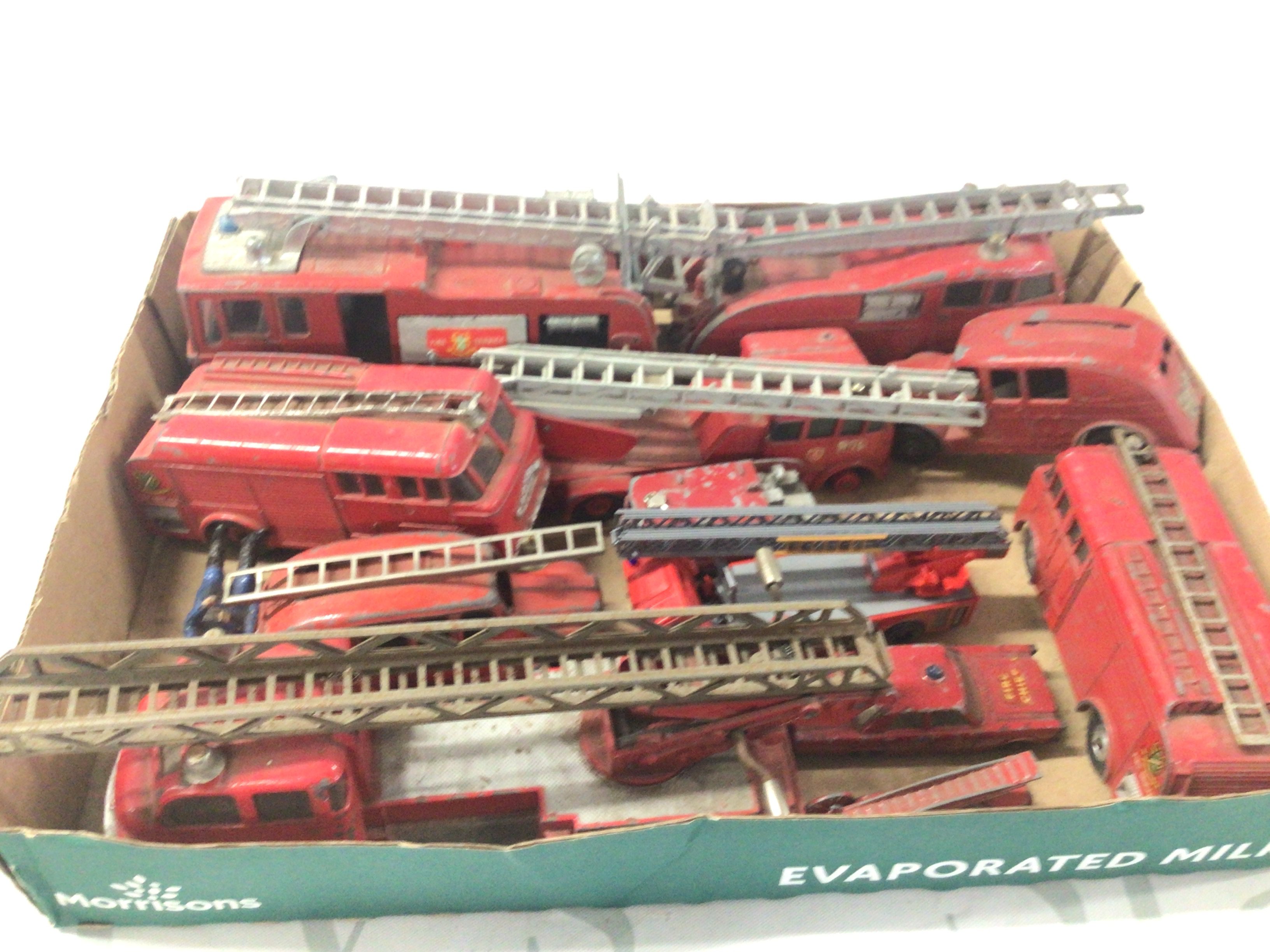 A collection of Playworn fire engines and other by Dinky etc.