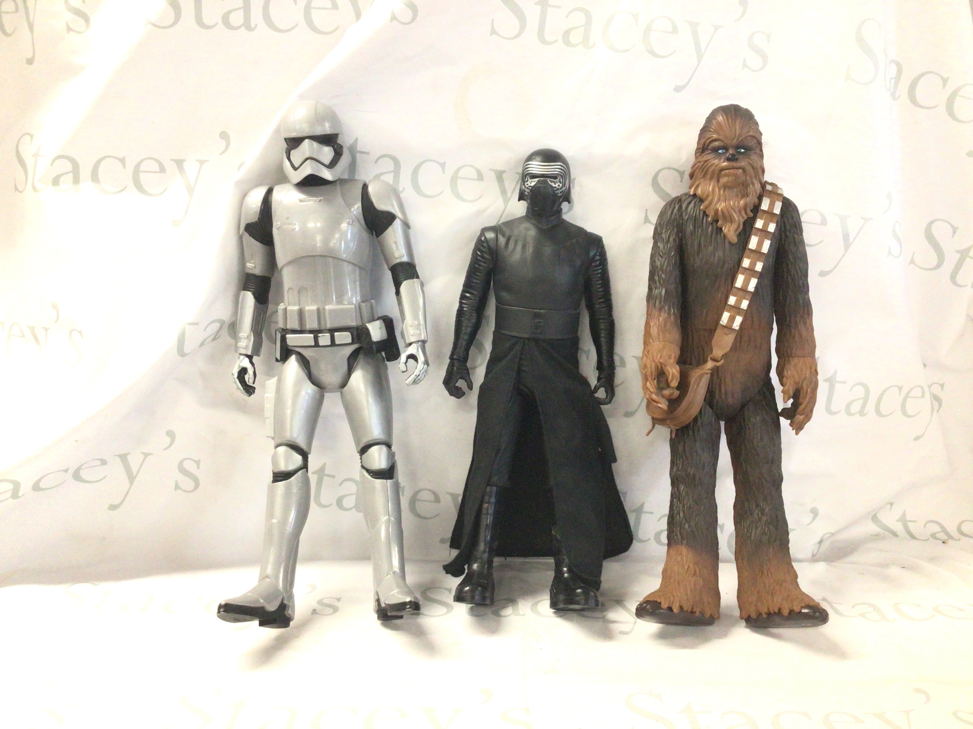 A group of three 20 inch Jakks Star Wars figures featuring Kylo Ren..Chewbacca and Captain Phasna no weapons.