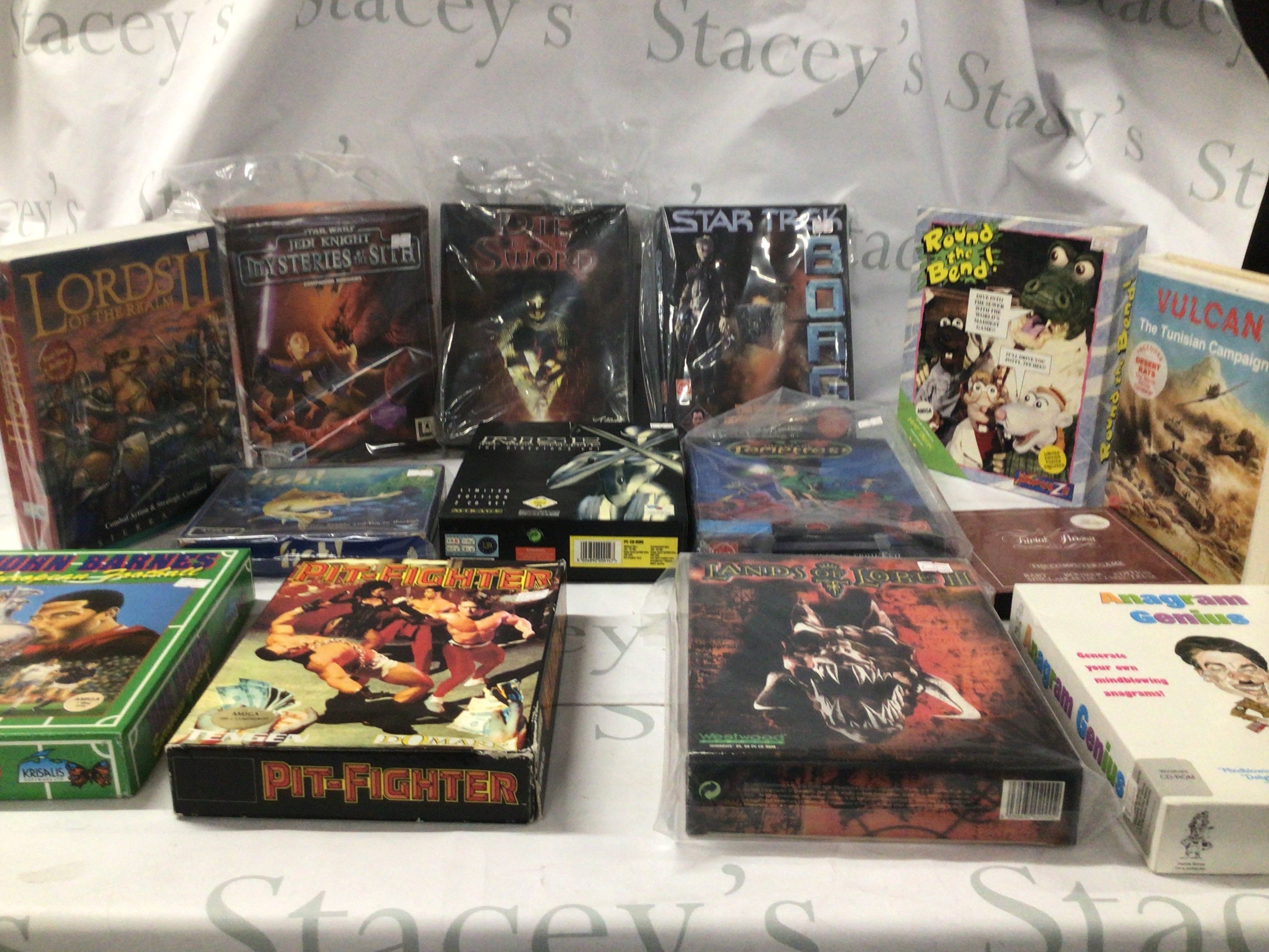 A collection in excess of 30 boxed games for PC..Amiga etc.