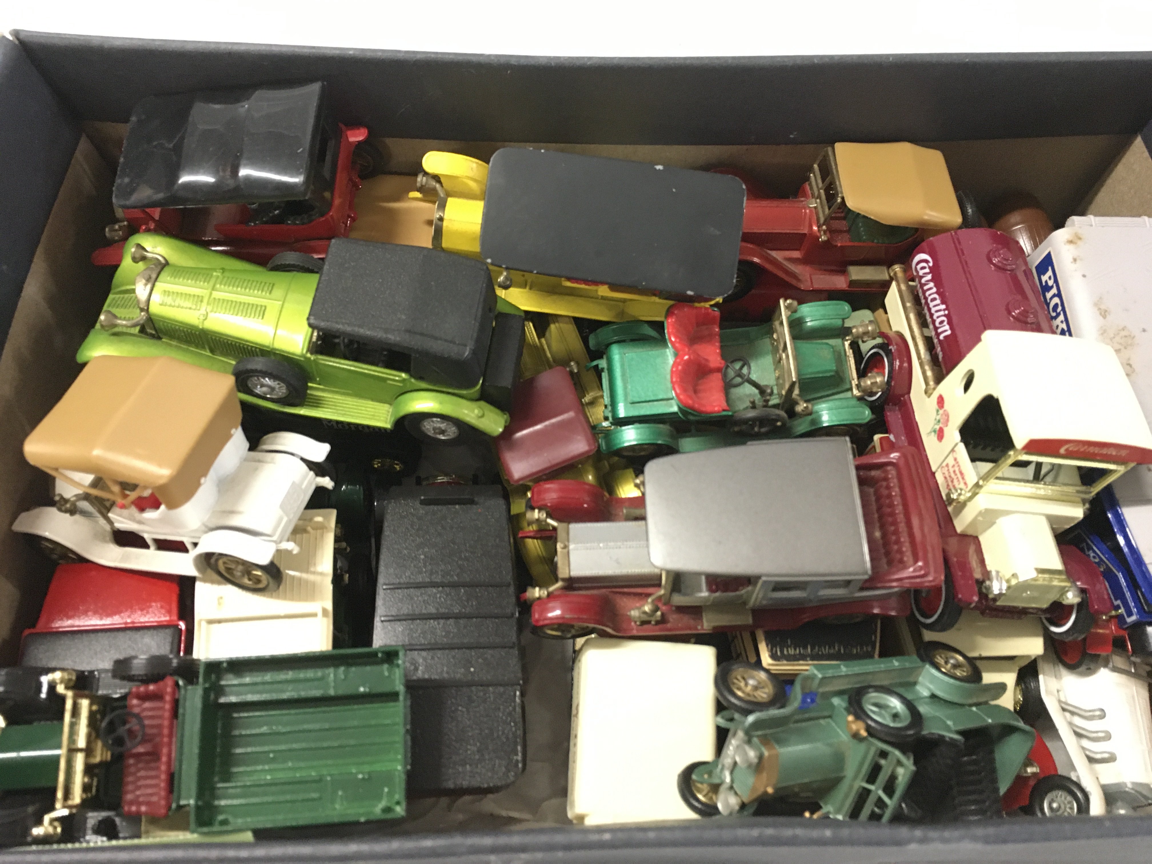 A box containing a collection of Matchbox diecast model vehicles from the Models of Yesteryear series. No reserve