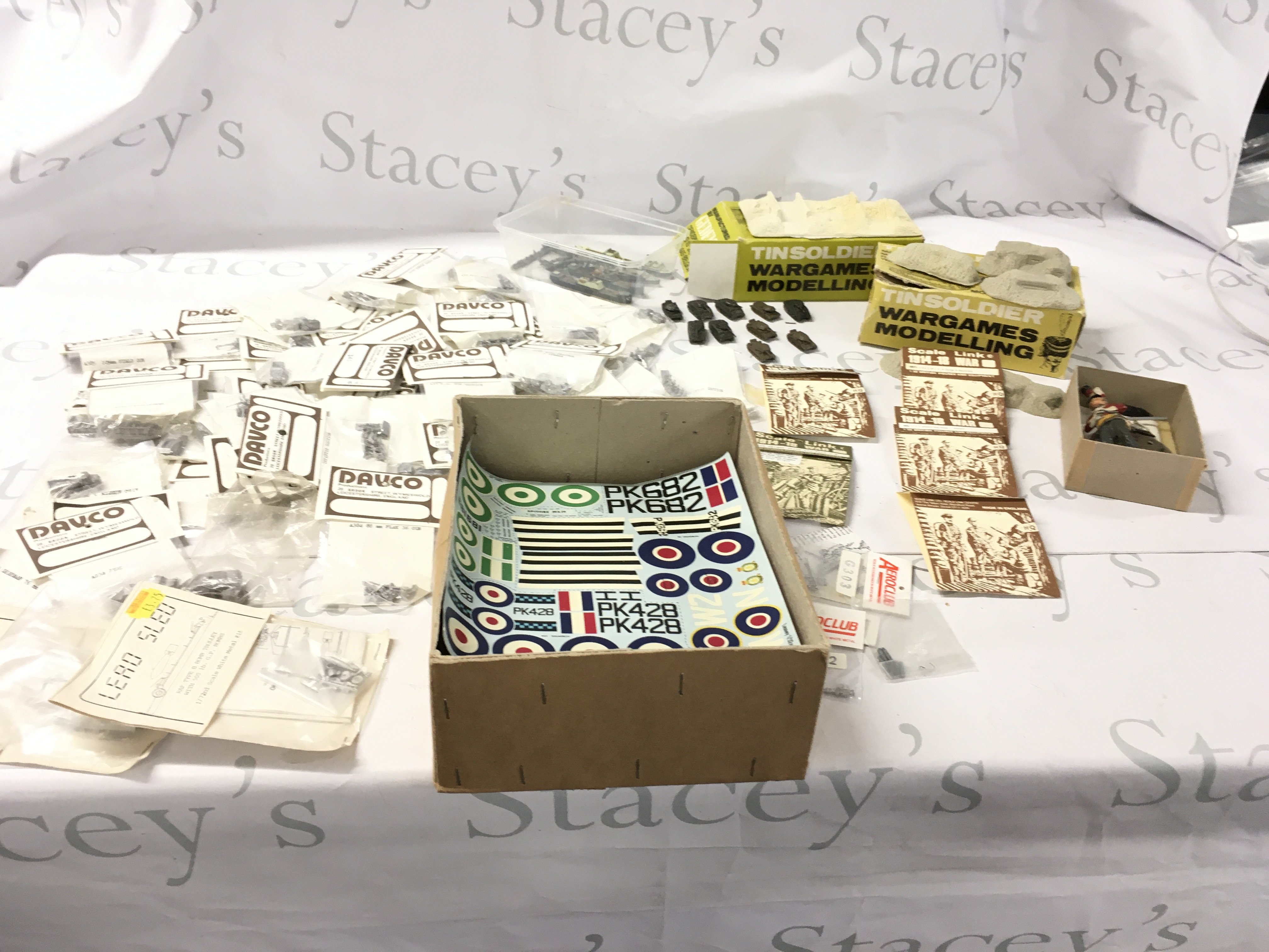 A collection of lead models for war gaming . Includes soldiers..vehicles and equipment sealed in packaging and requiring painting. Also includes a box containing transfers and decals. No reserve