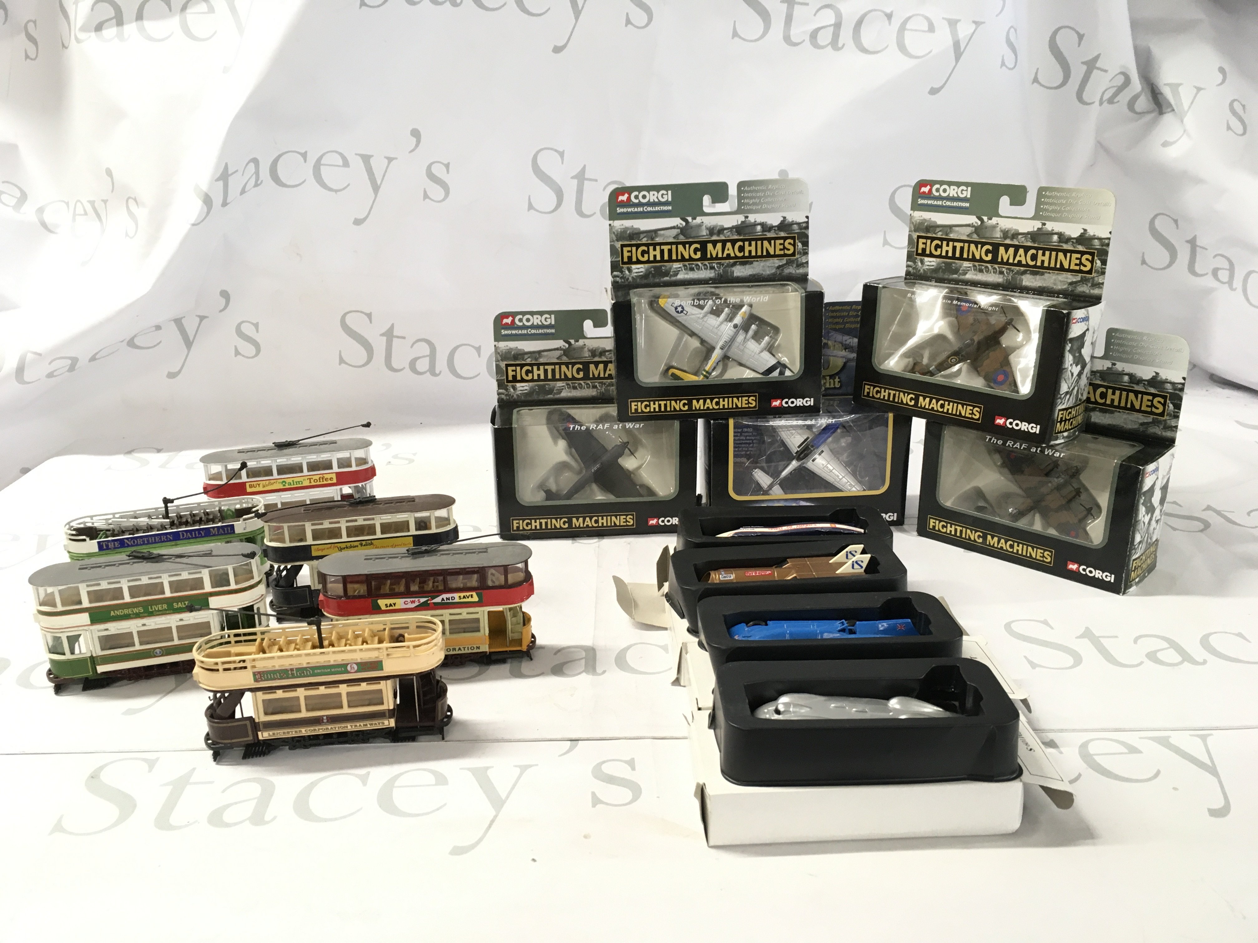 A collection of diecast models featuring 5x boxed Corgi planes in the Fighting Machines Series. 4x boxed Lledo speed record cars and 6 loose Corgi trams. No reserve