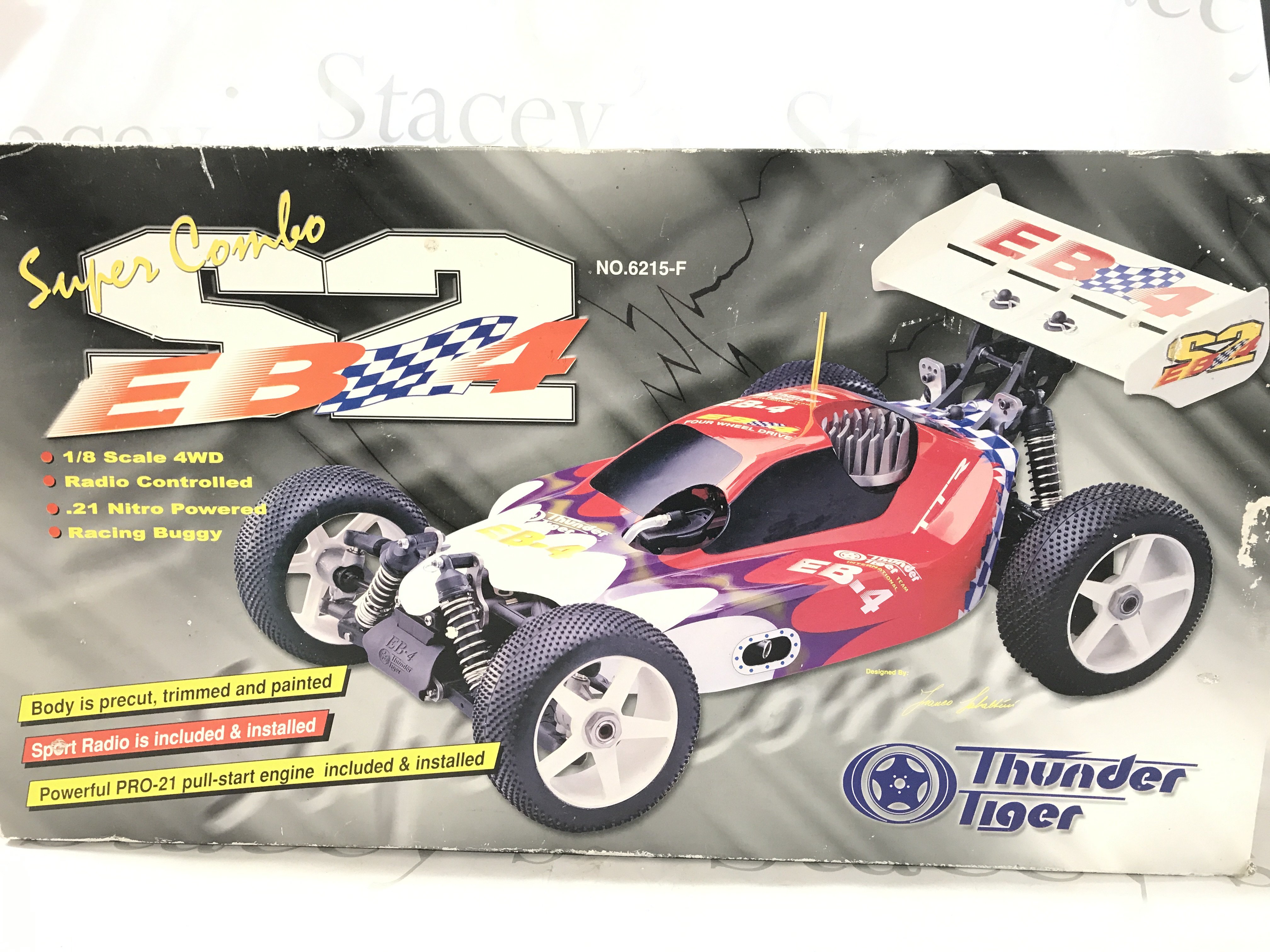 A Boxed Super Combo Thunder Tiger 1/8 Scale Remote Controlled Car.