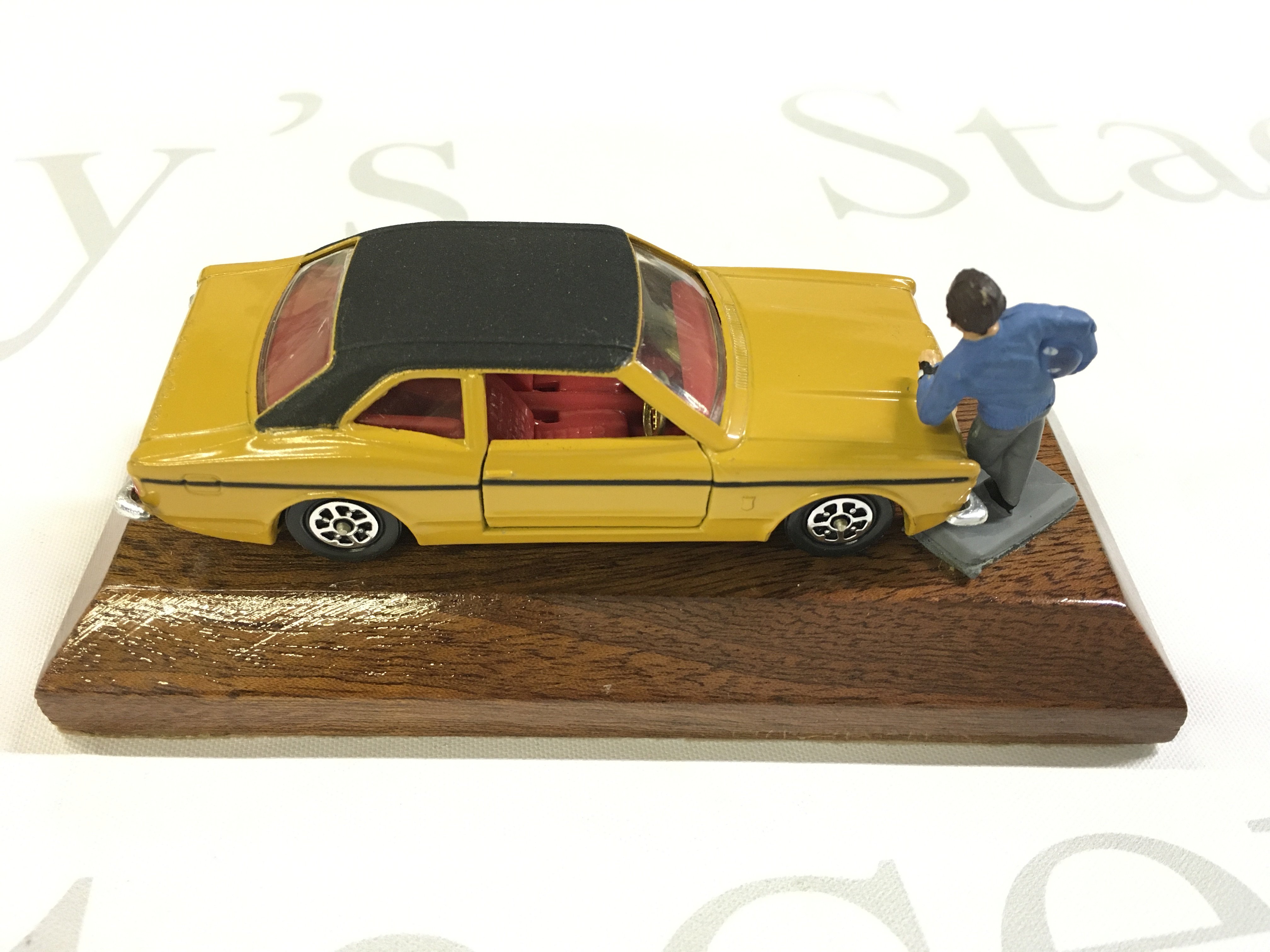 A Rare Corgi Ford Cortina Gxl #313 on wooden Base. Given to Dealerships. With Graham Hill Figure.