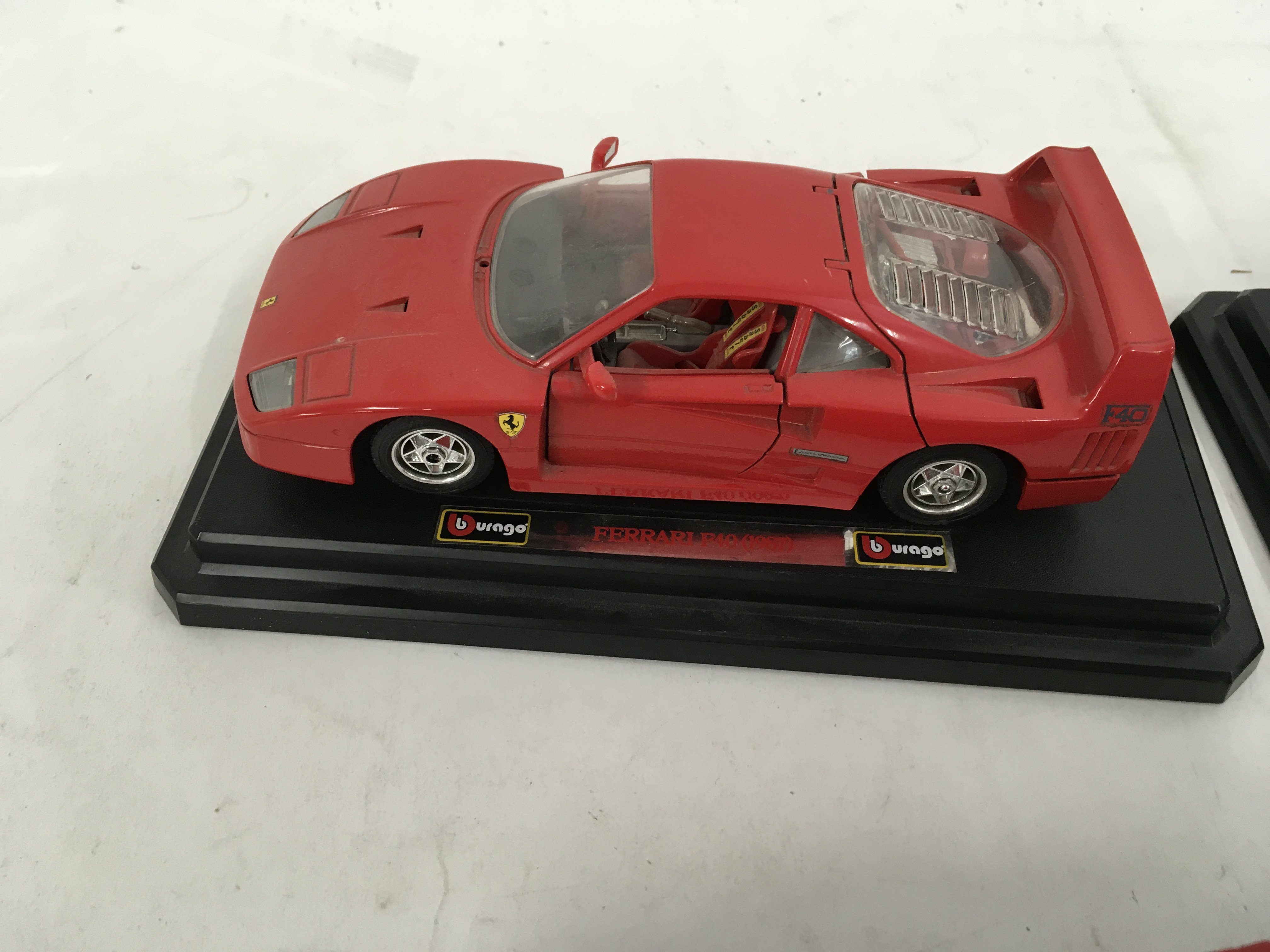3 x model Ferraris by Burago and 7x Playworn diecast cars. No reserve