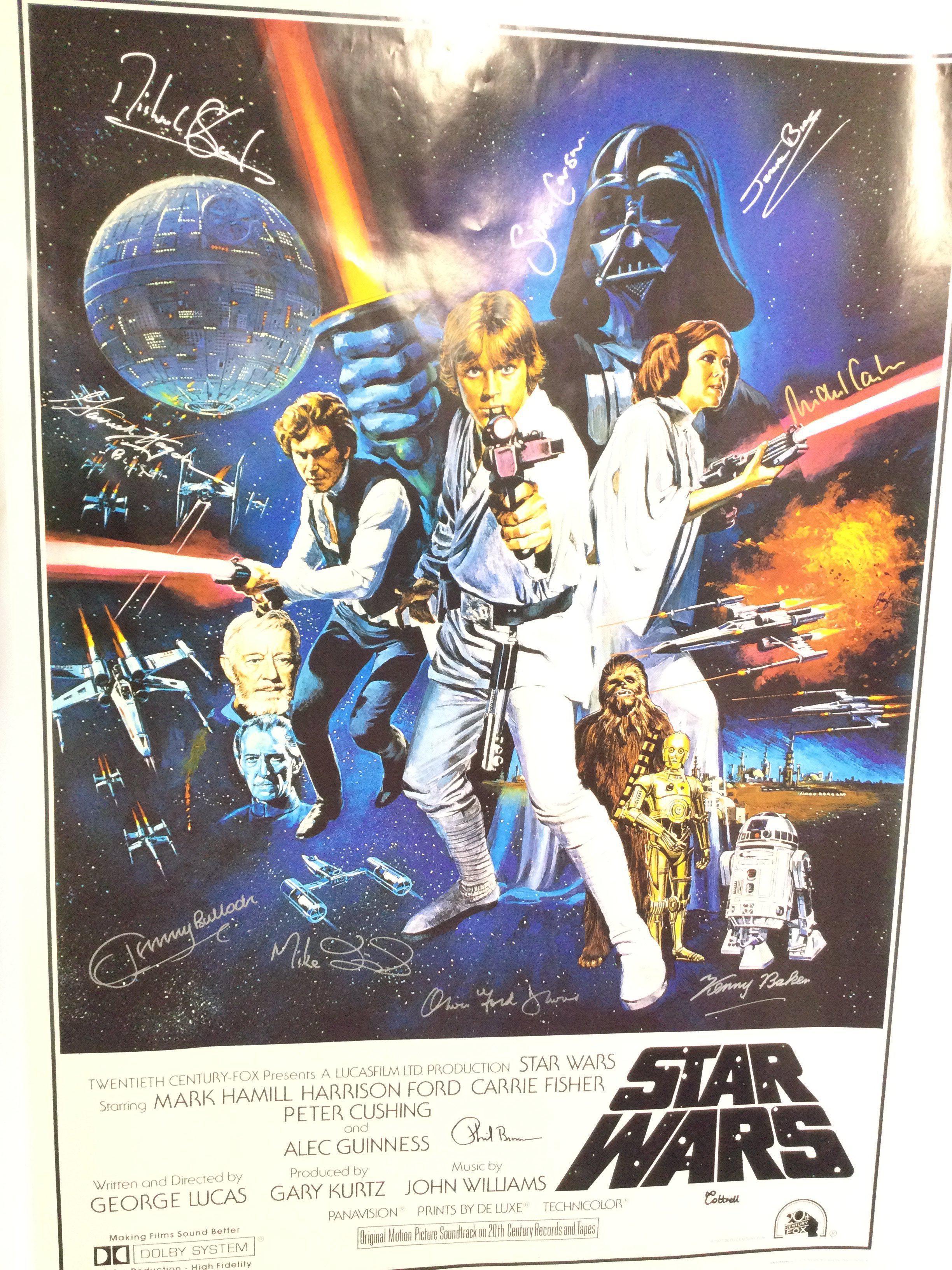 A Star Wars Episode IV Signed One Sheet Poster. Signed By 11 Actors. Kenny Baker. Jerome Blake. Phil Brown. Jeremy Bullock. Silas Carson. Mike Carter. Michaela Cottrell. Oliver Ford Davies. Mike Edmonds. Garrick Hagen. And Michael Sheard. With COA. Also A Framed David Prowse Picture.