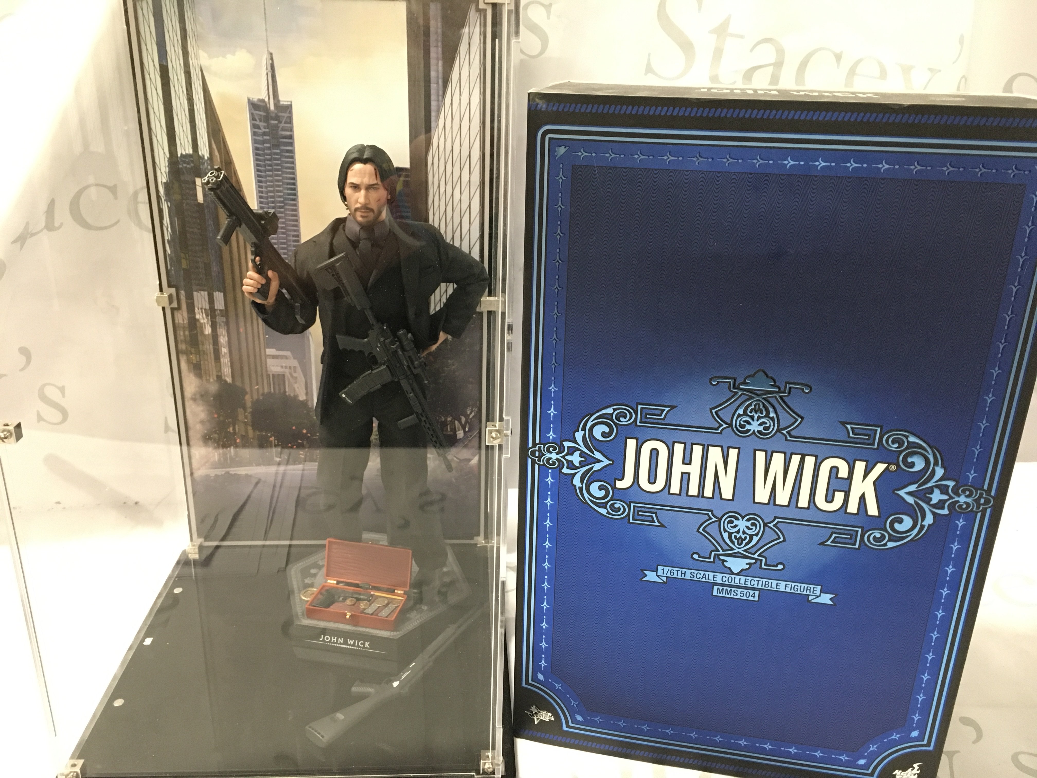 A 1/6th Scale Model Of John Wick In A Perspex Case with Box. By Hot Toys.(2). No Reserve.
