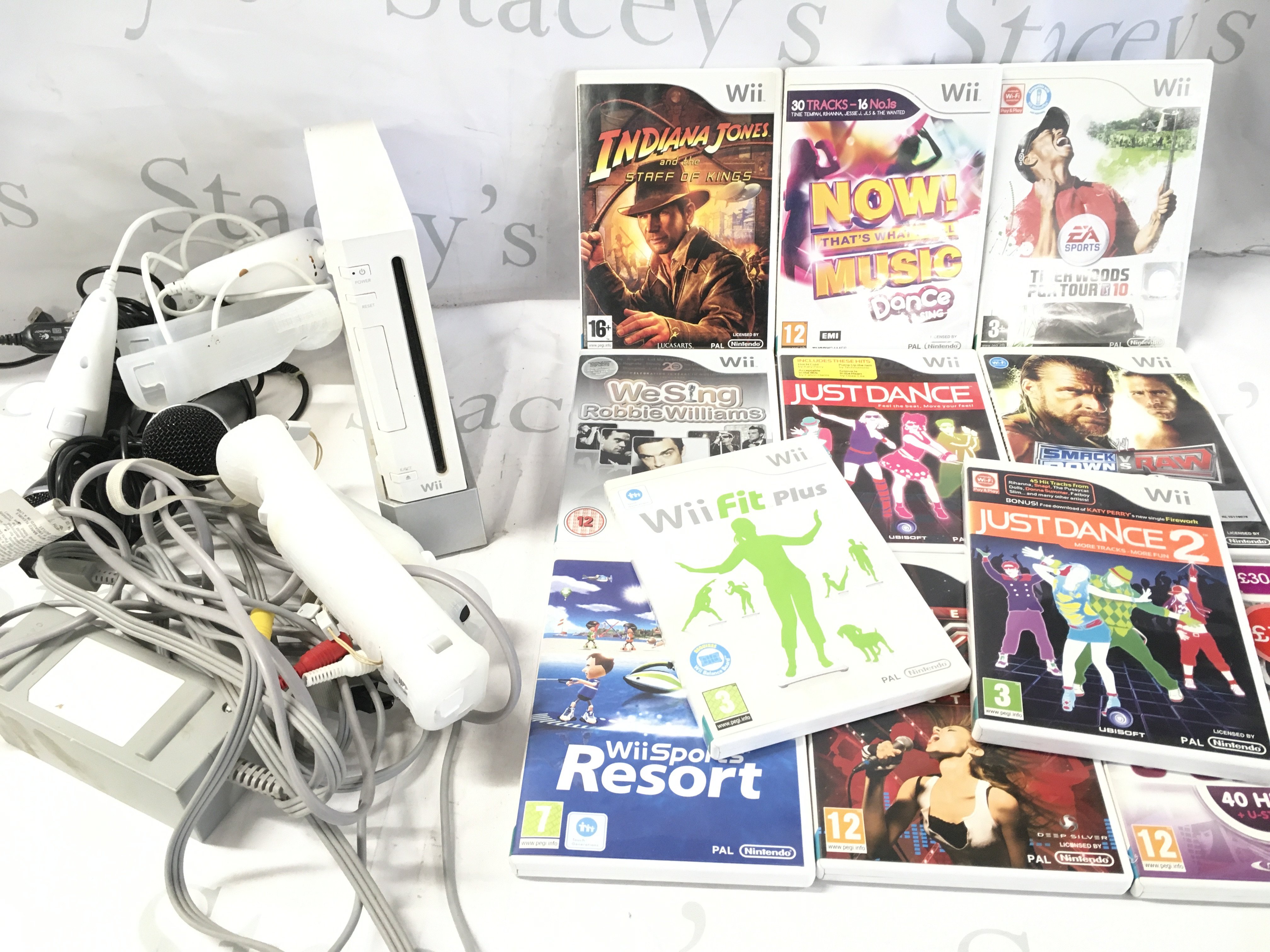 A Nintendo Wii with A Collectible Of Games And Accessories.