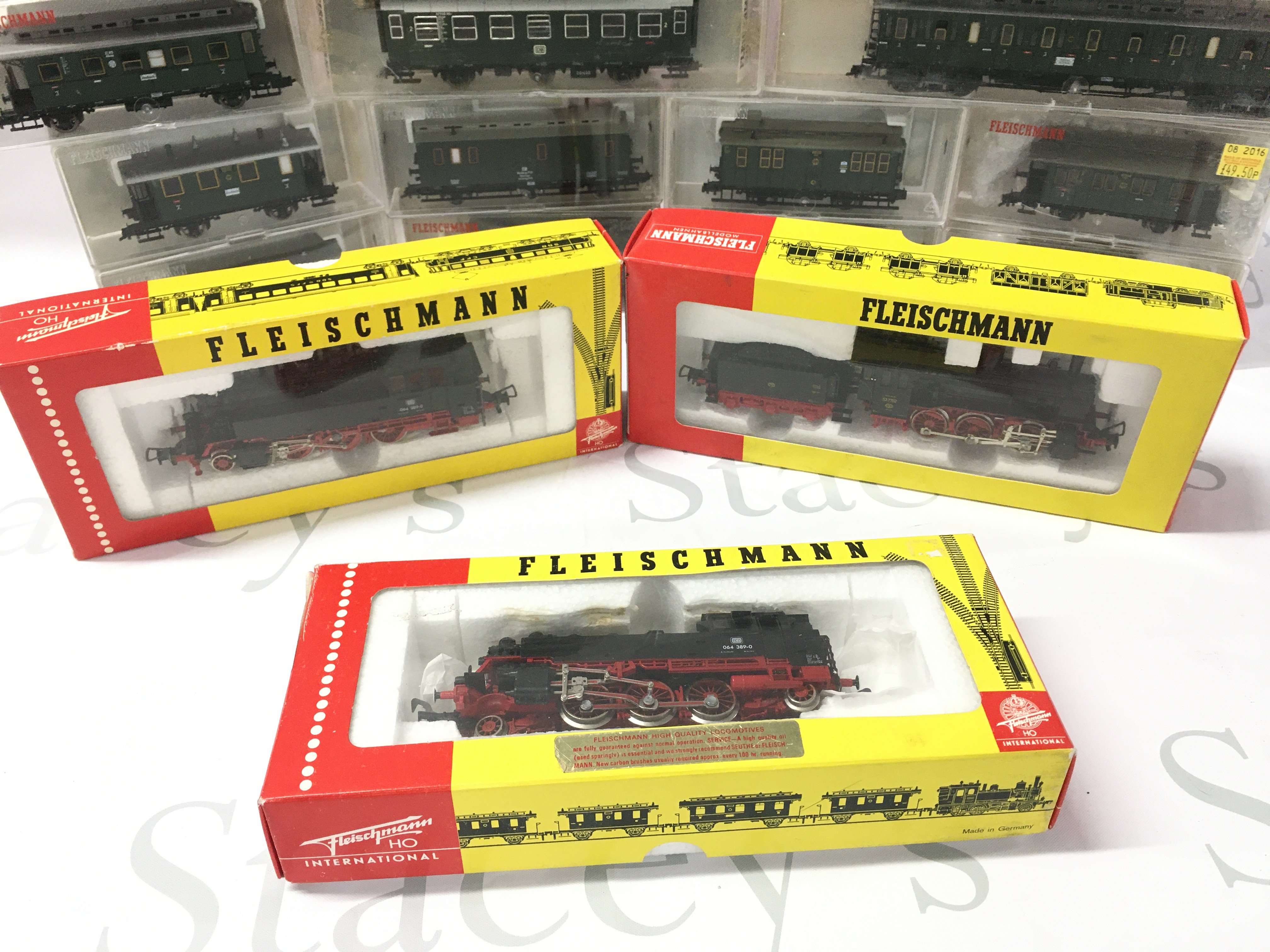 3 Boxed Fleishmann H0 Gauge Locos with A Collection Of Boxed Coaches.