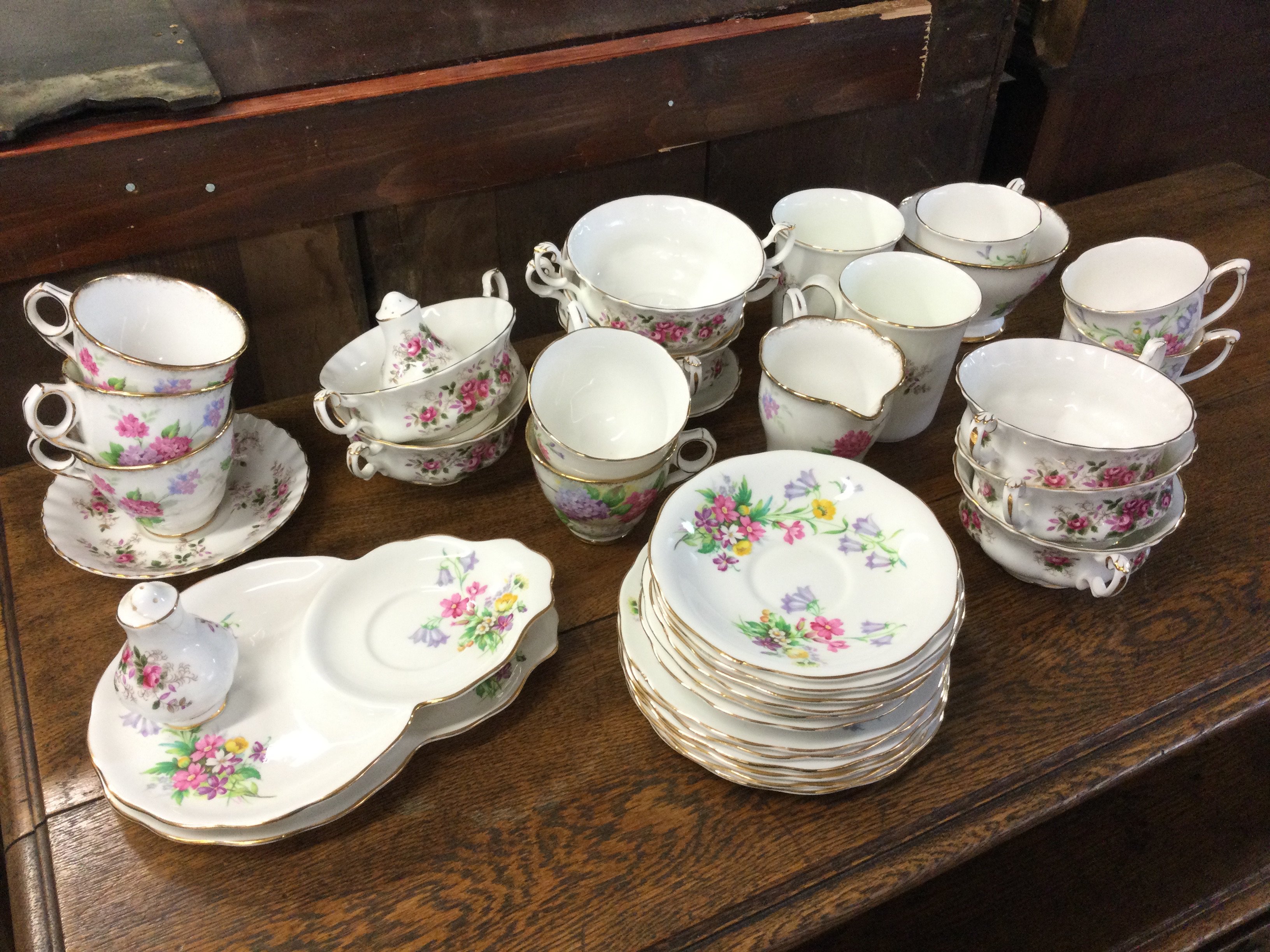 Tea sets Old Country Spray by Queen Anne, Carousel Royal Stafford including saucers, cups etc. this lot cannot be posted