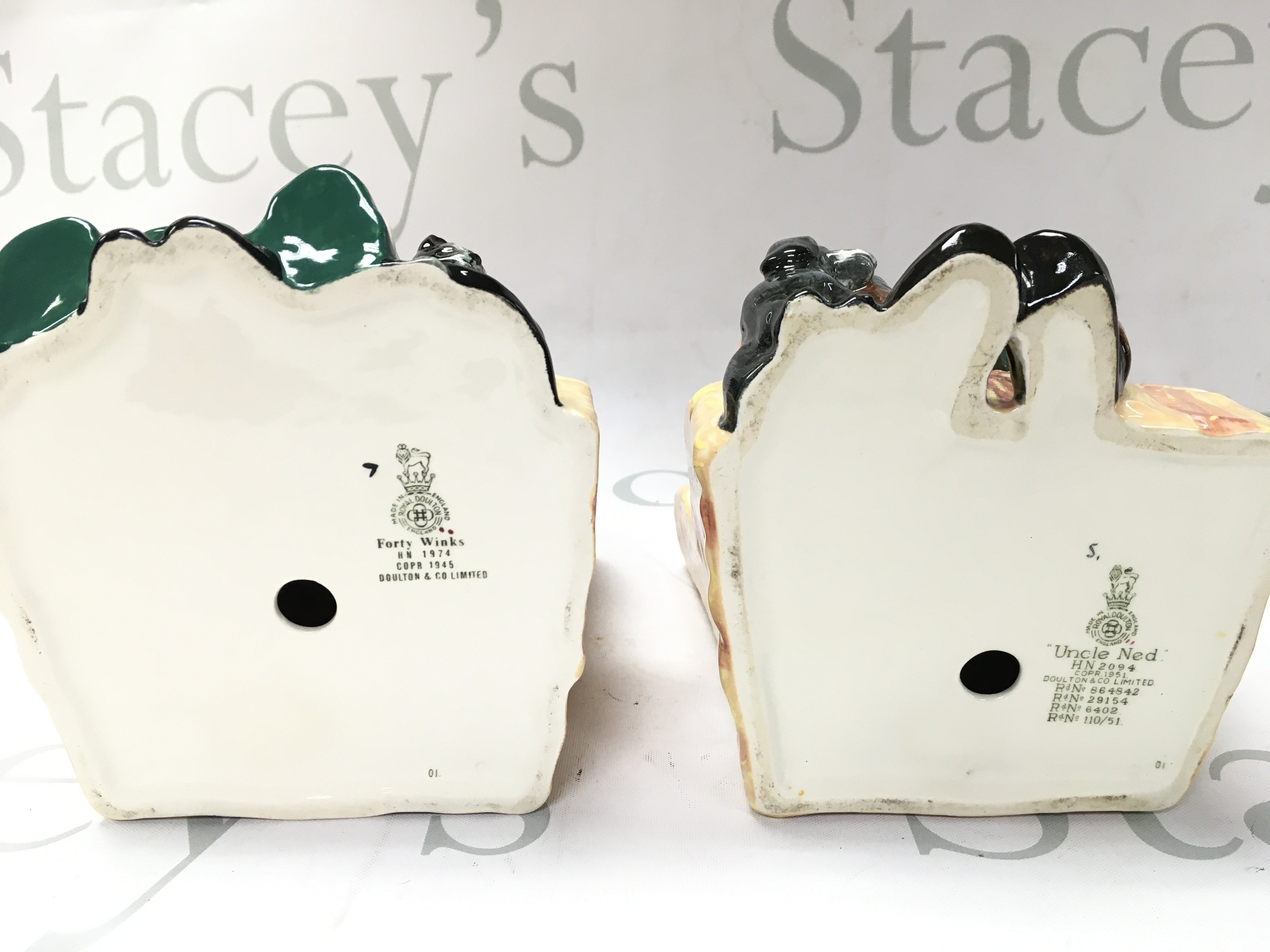A pair of Royal Doulton figures , Uncle Ned and Forty Winks . No obvious damage or restoration NO RESERVE