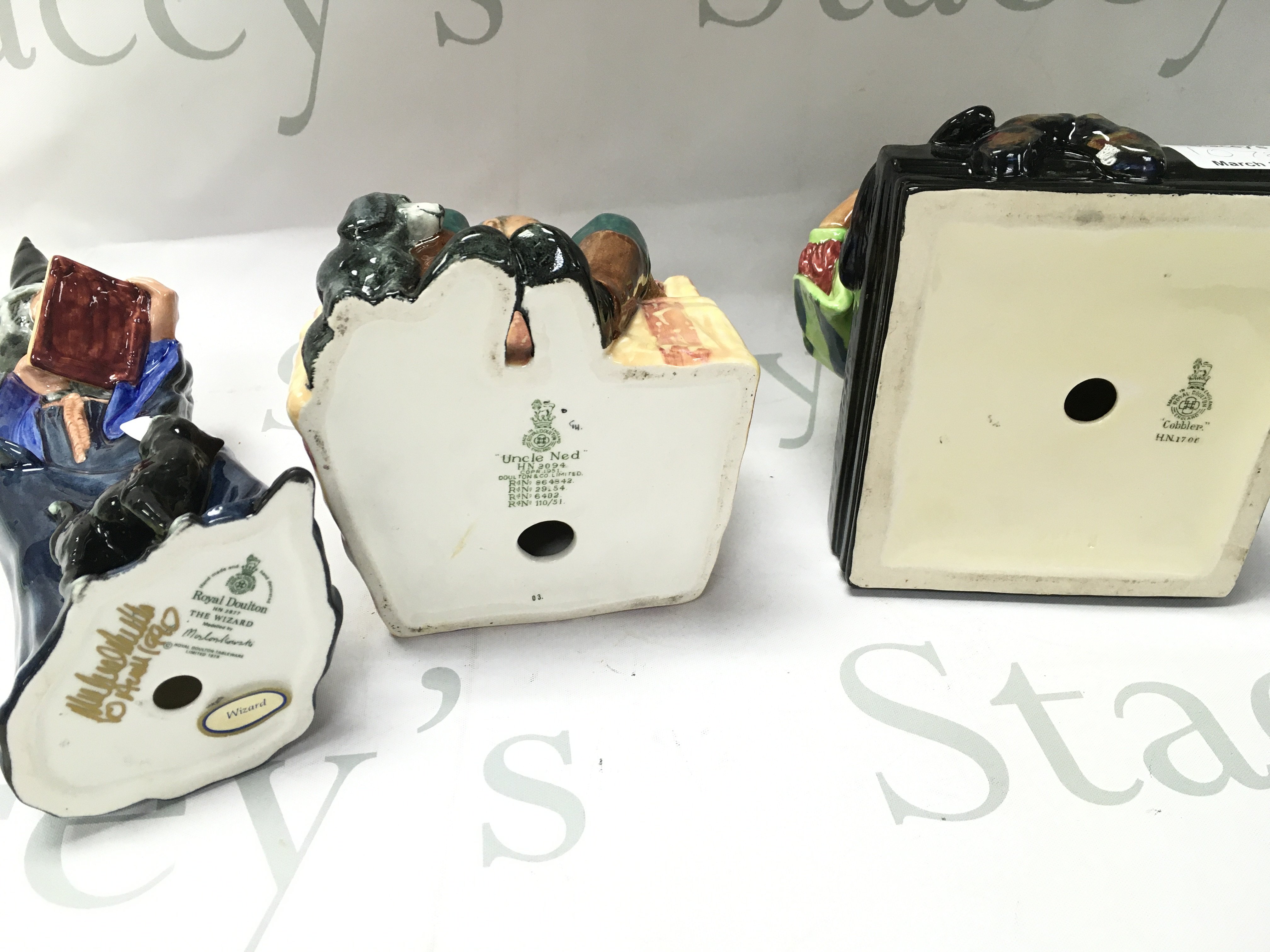 Royal doulton figures including Uncle Ned, Cobbler, The Wizard. No obvious damage or restoration