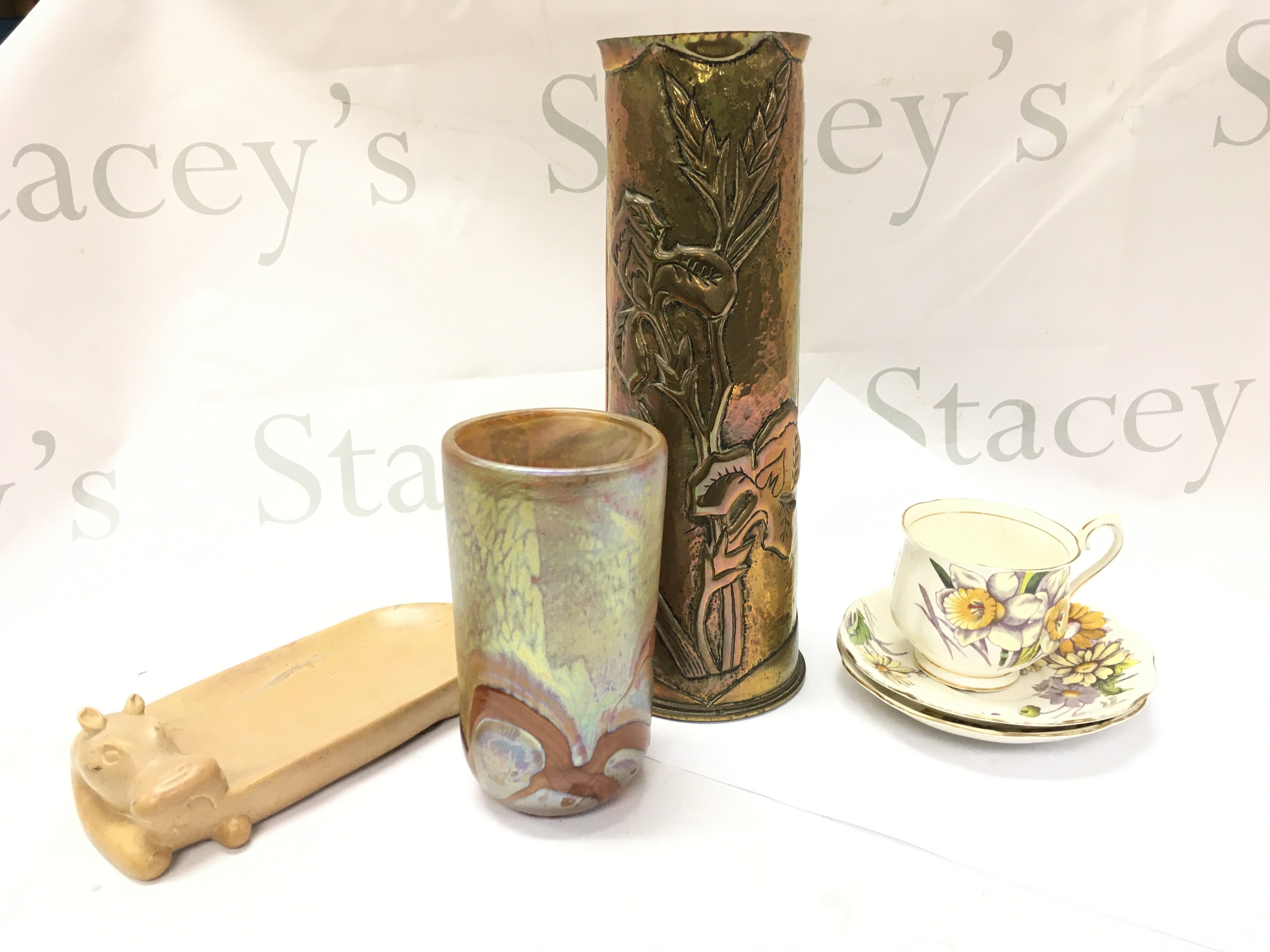 A collection of items including a Cold cast owl figure, ceramic biscuit barrel, swan vase , pewter pot, 1914 shell case trench art vase, royal albert daffodil cup and saucers This lot cannot be posted NO RESERVE