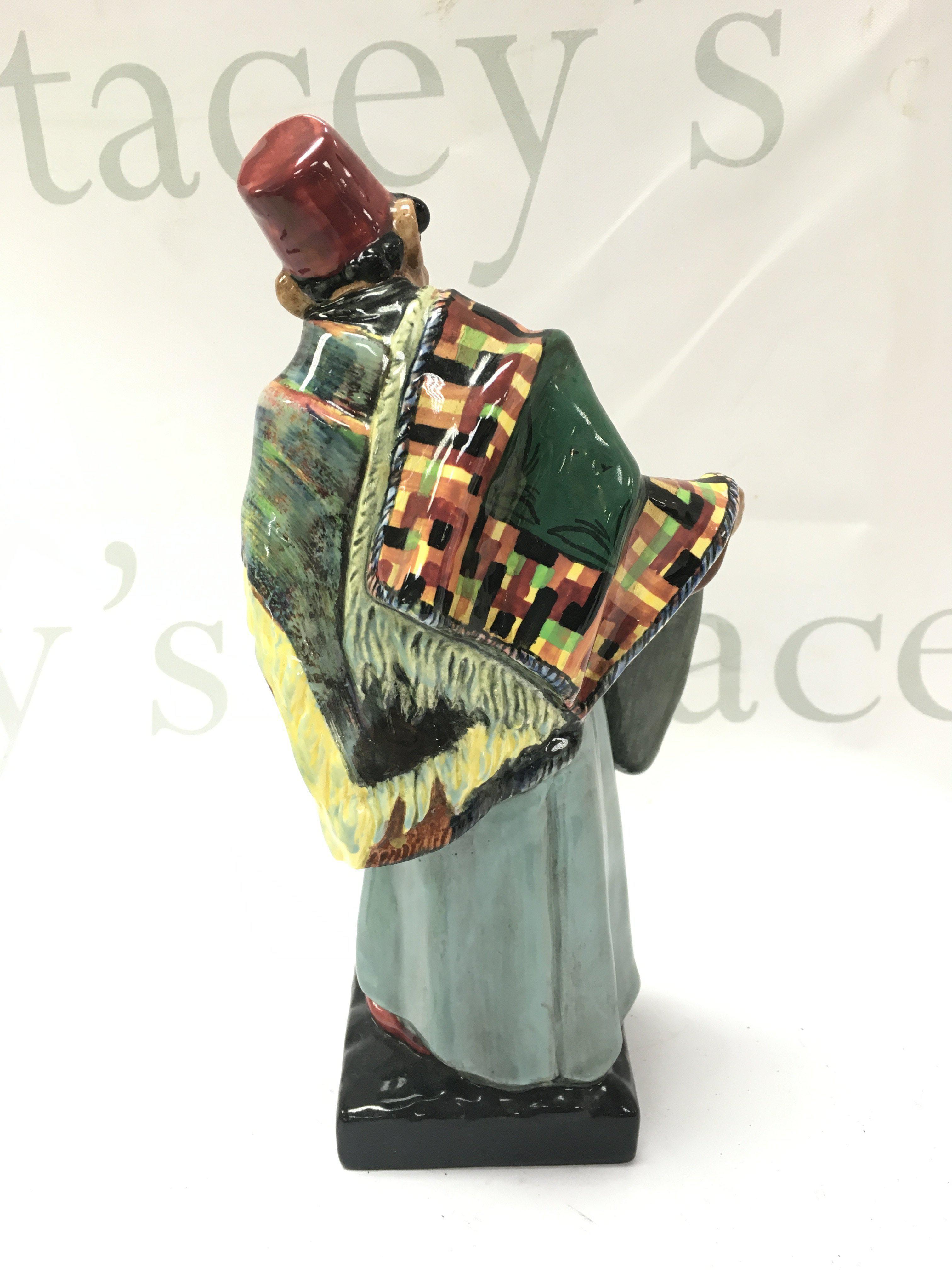 A Royal Doulton porcelain figure, Carpet Seller . 23cm tall NO RESERVE