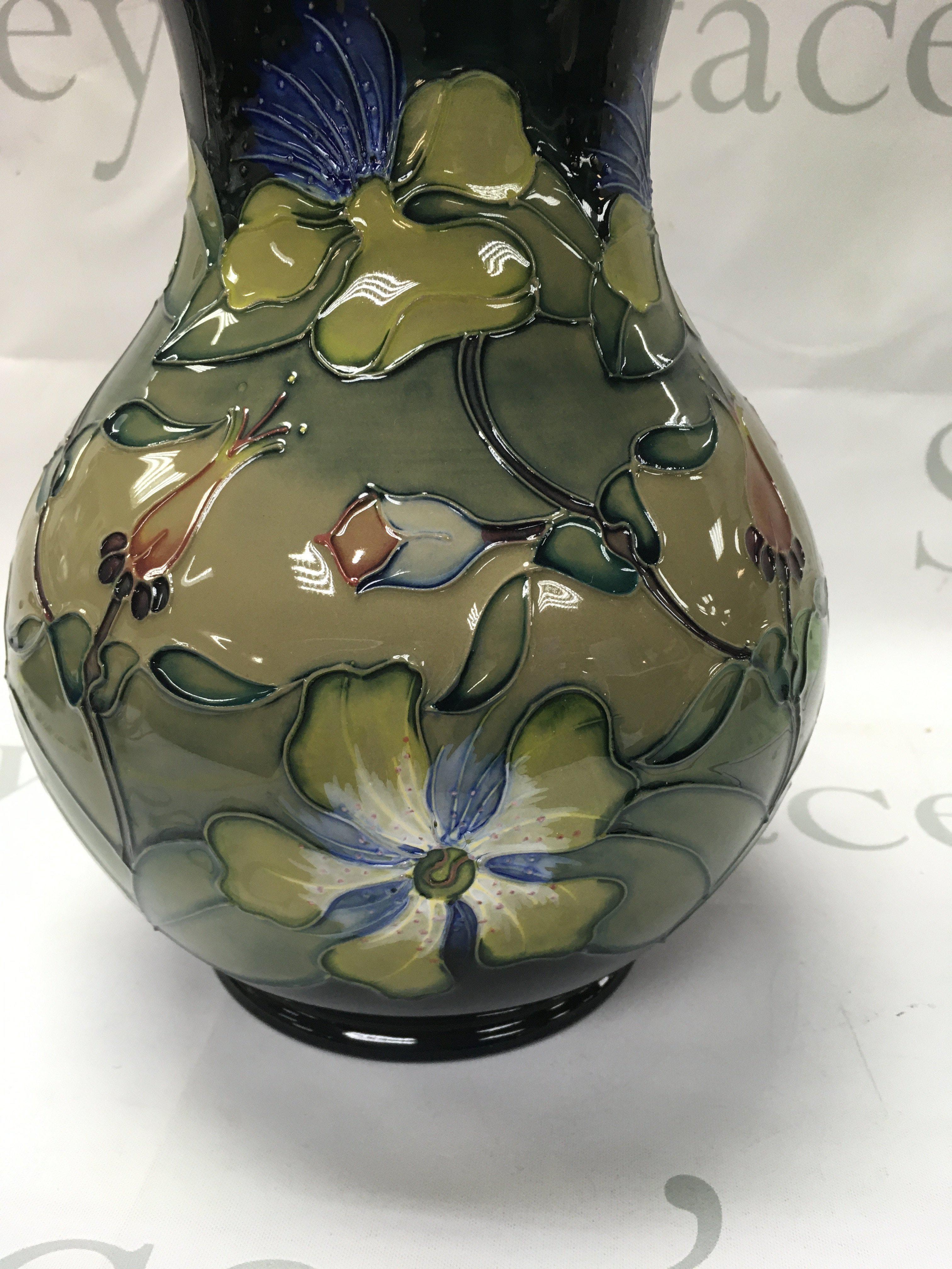 A Moorcroft Hyericum Rachel Bishop vase 25 cm .