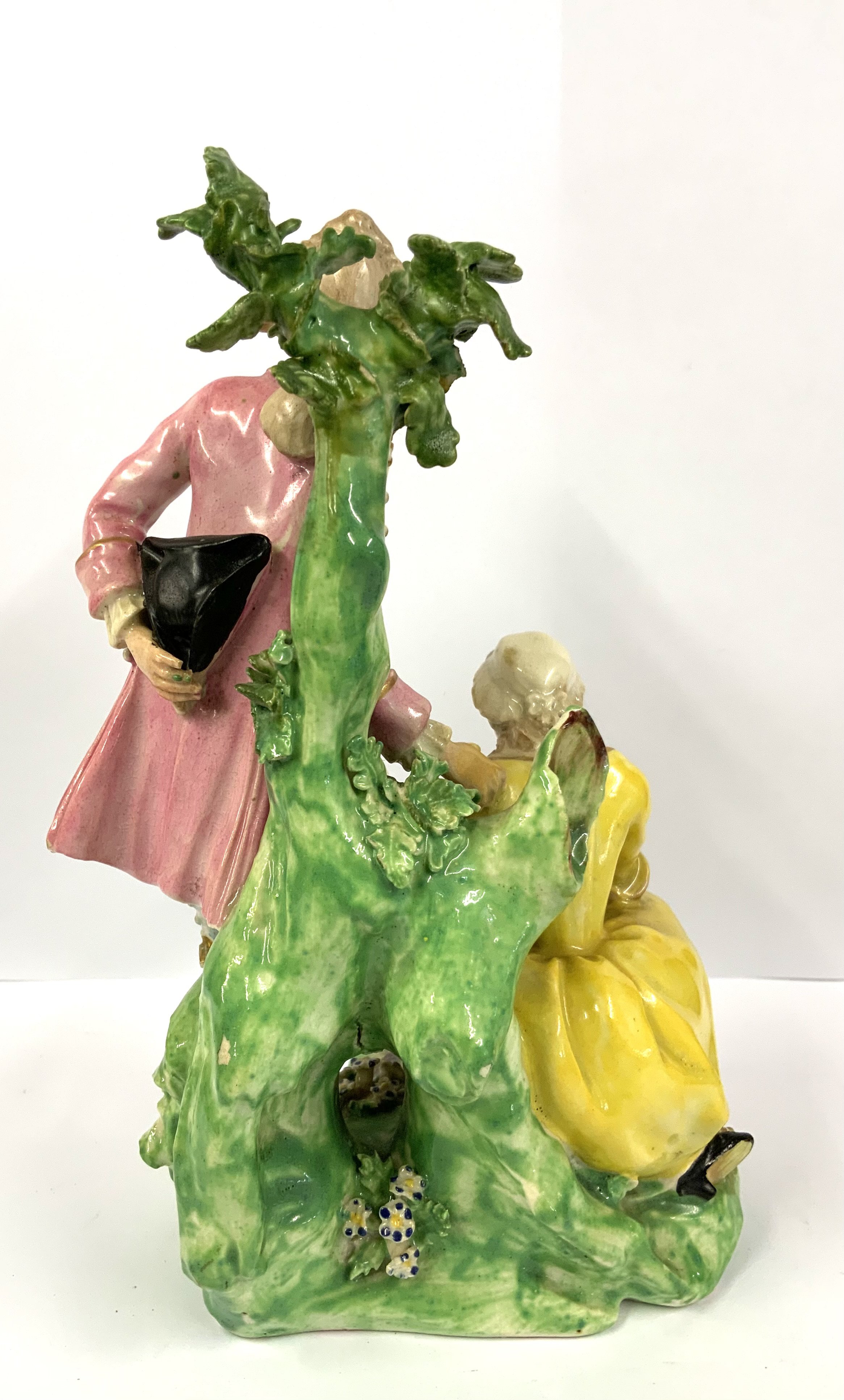 A Bloor Derby group figure of a shoeblack modelled as a girl polishing the shoes of a gentleman, 17cm, marked No.81, c.1820. (D) NO RESERVE