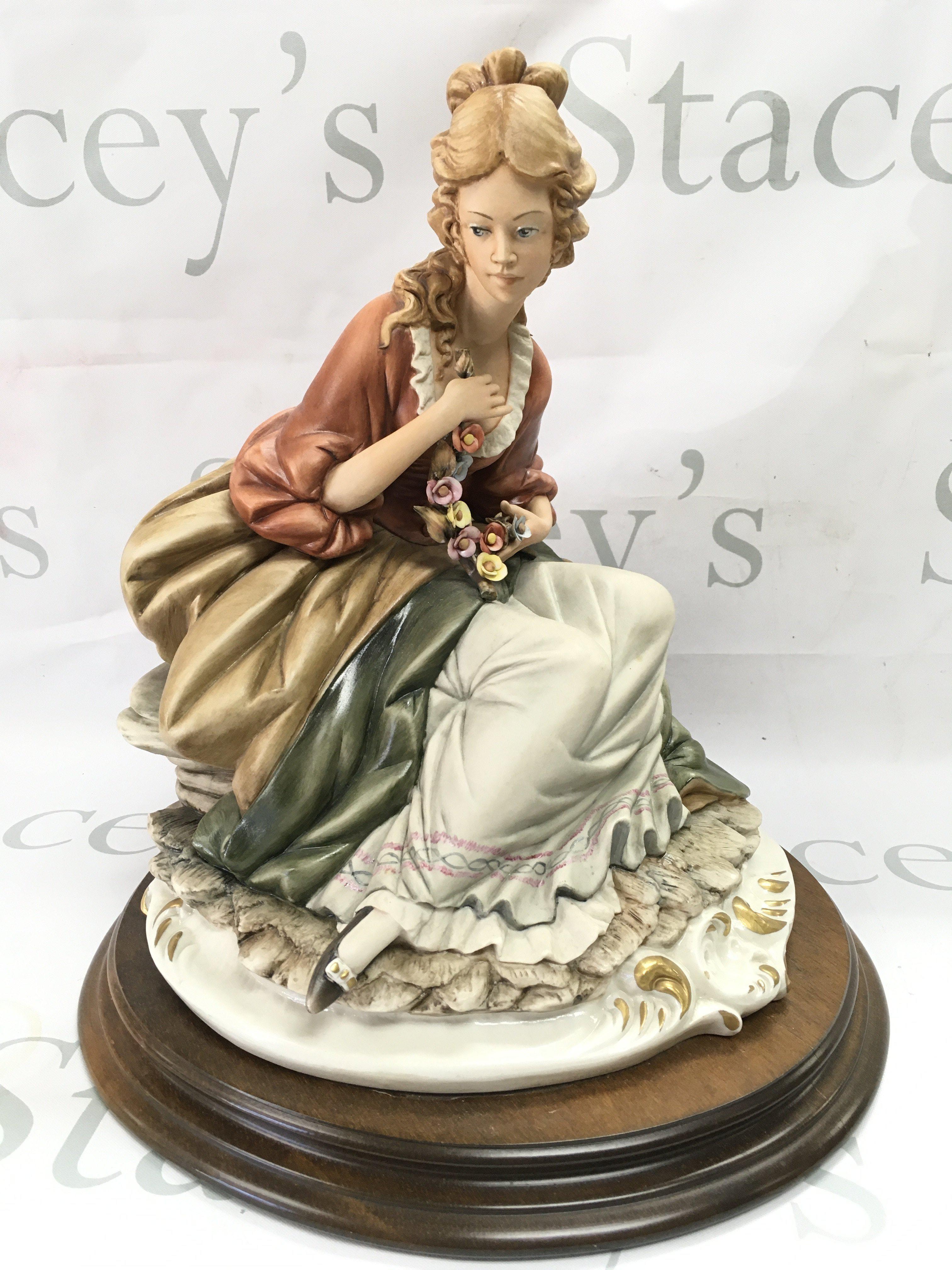 A Capodimonte figure by Raffaello Bedin , 32cm tall. This lot cannot be posted