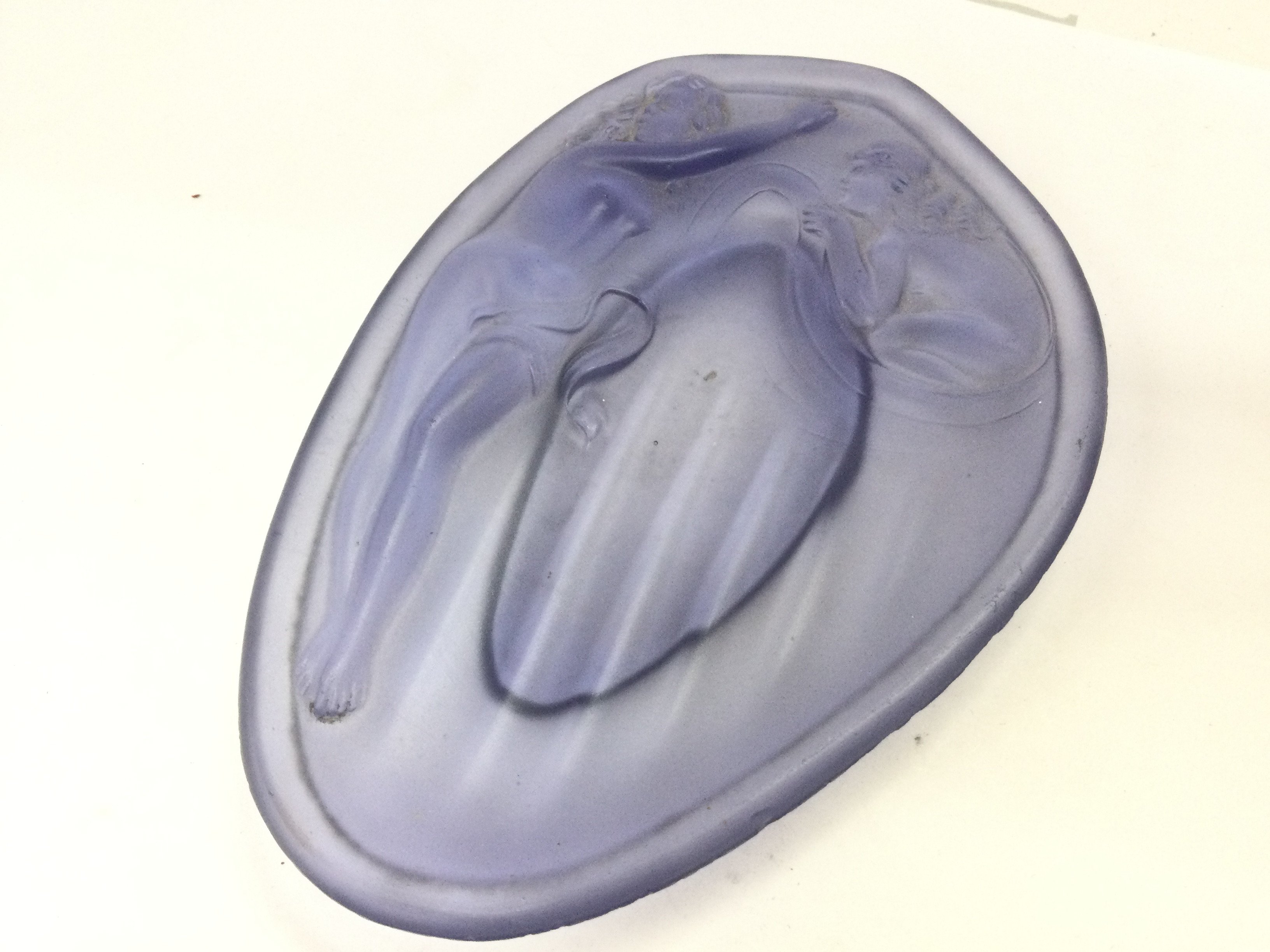 A small Art Deco glass dish with nude women design. 16cm tall. This lot cannot be posted