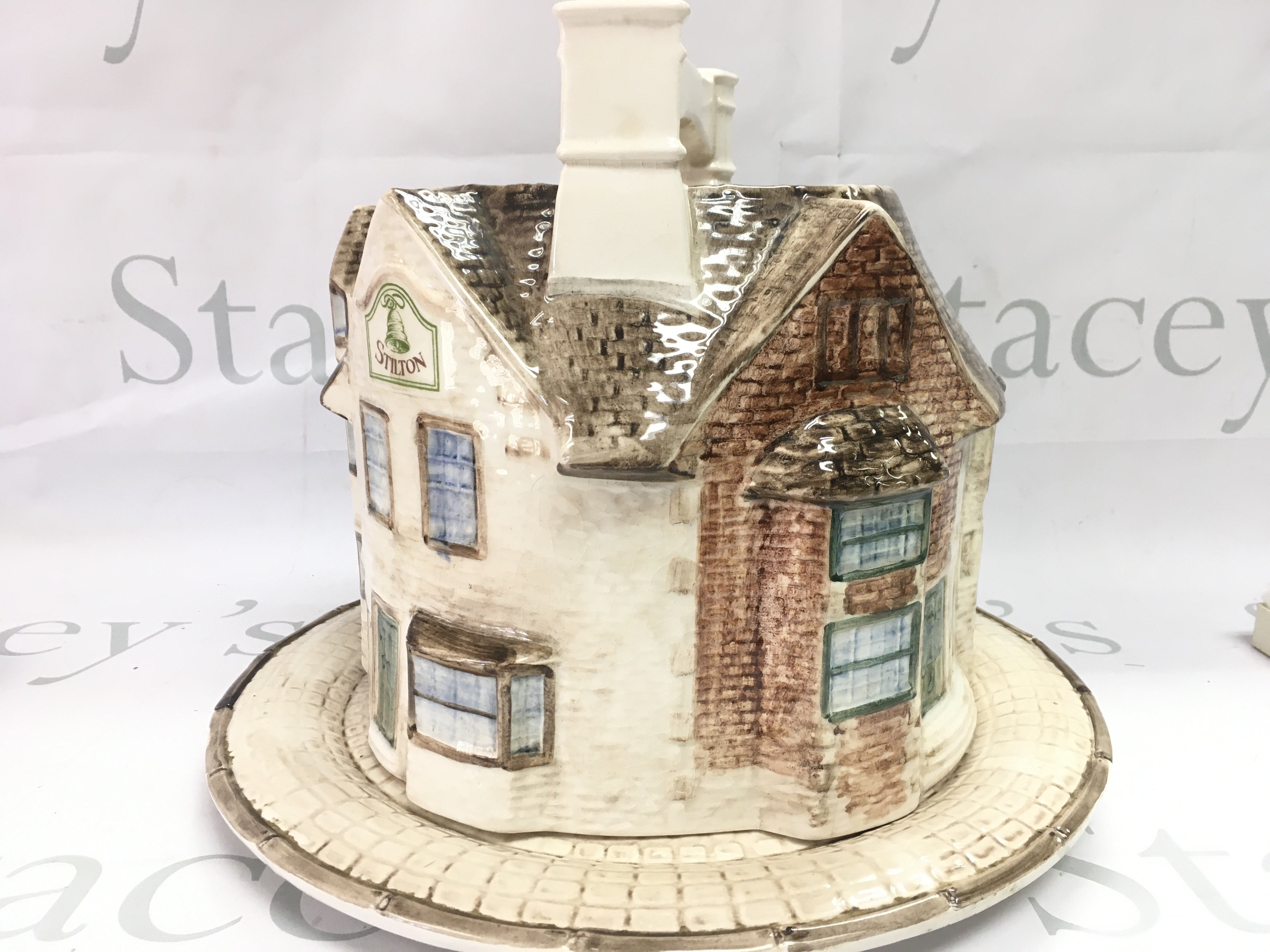 Harrods Bell Inn Stilton cheese dome , made and hand-painted in Staffordshire exclusively for Harrods Knightsbridge, a registered design of The London Pottery company . 23cm tall. This lot cannot be posted