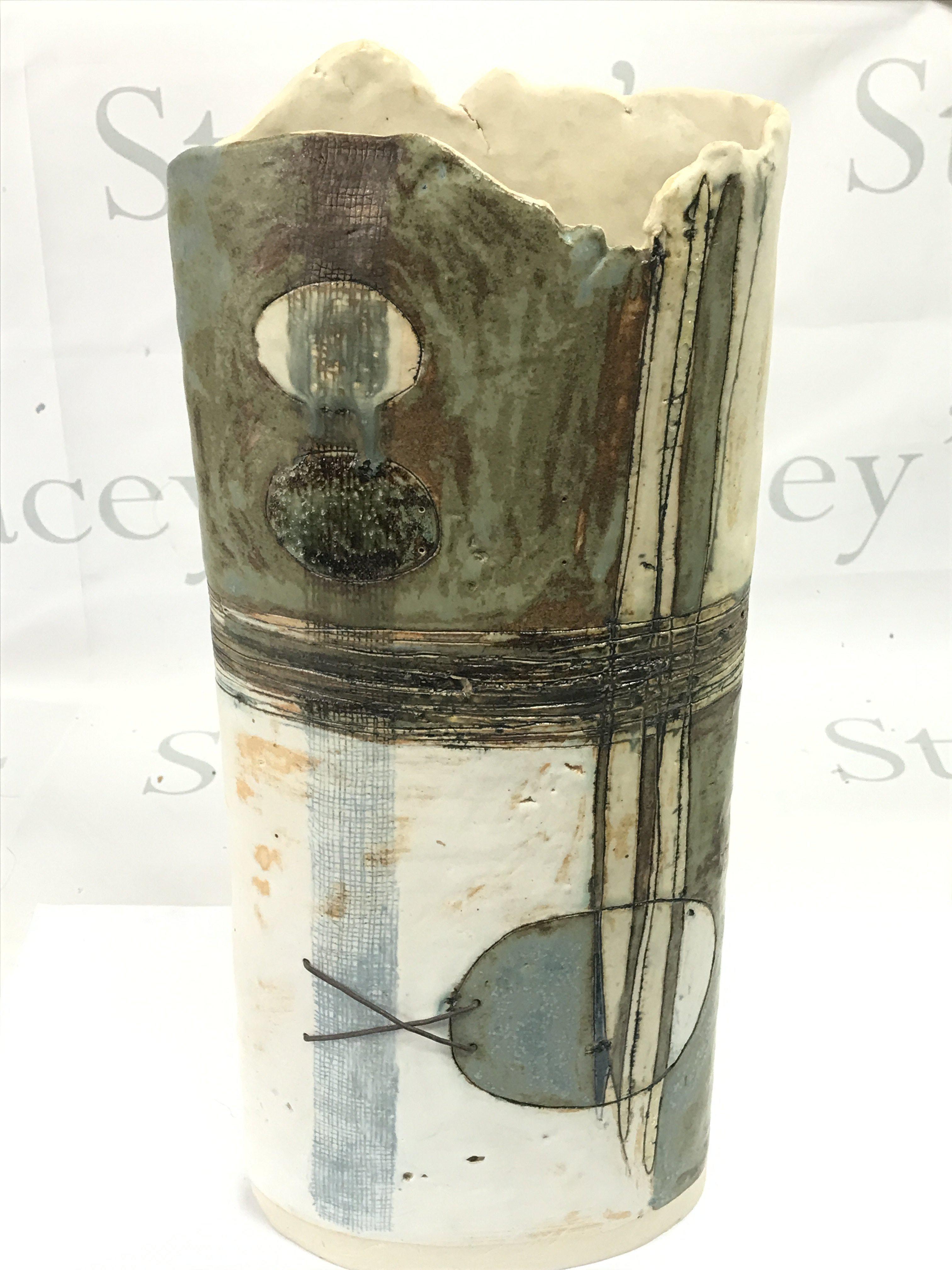 A tall studio pottery vase , 40cm tall. This lot cannot be posted