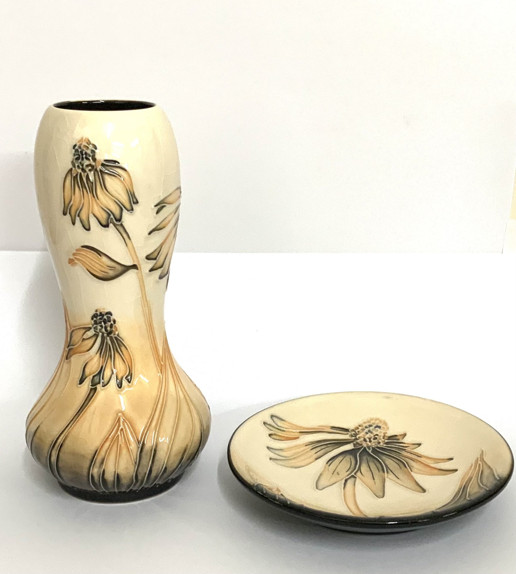 A small Moorcroft pottery gourd shaped vase with cornflower design, 16cm and a small pin dish with similar design.
