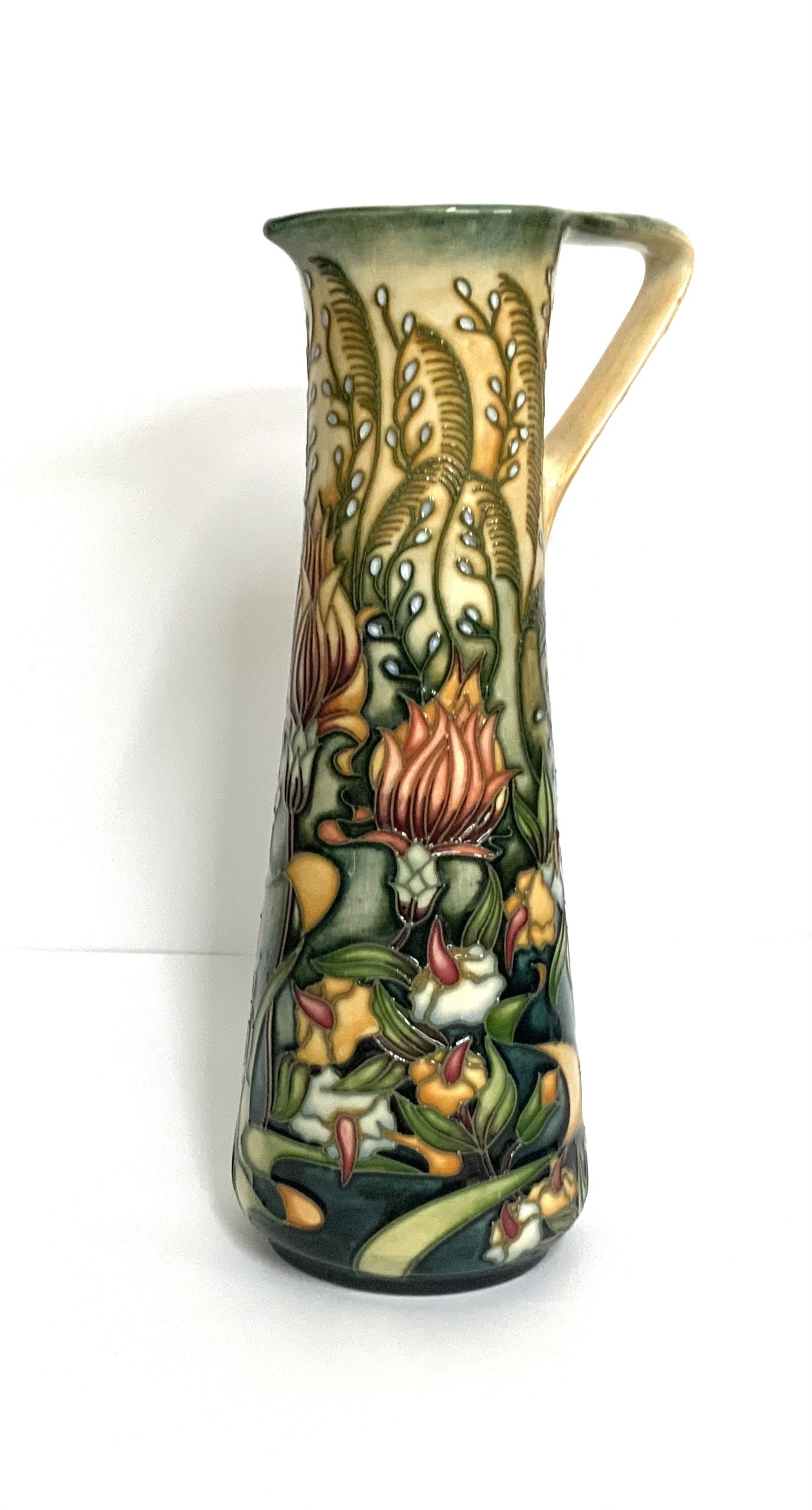 A Moorcroft pottery ewer decorated in the Prairie pattern, designed by Rachel Bishop, impressed marks and dated 2001, 23.5cm high