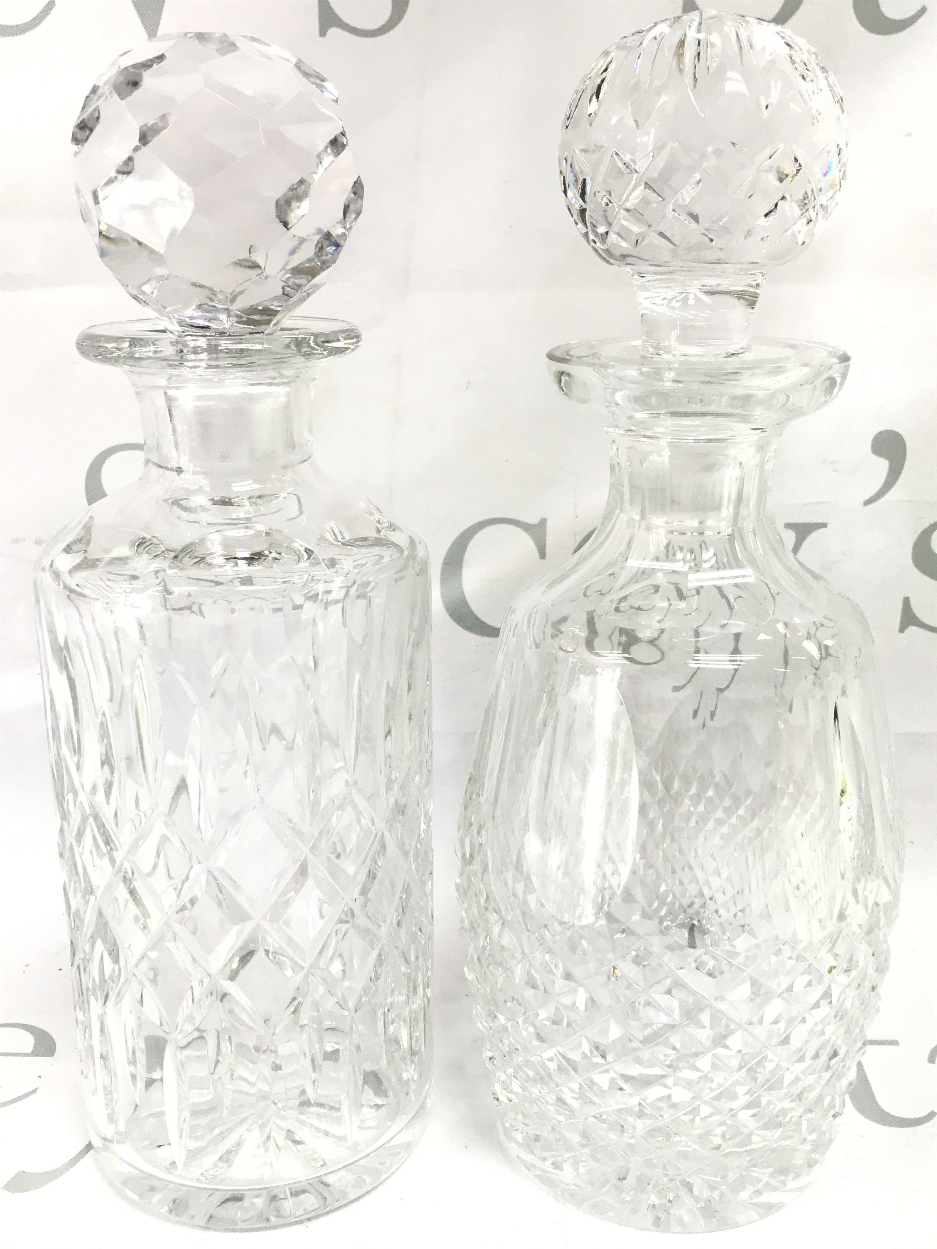 Two quality cut glass decanters , 27cm tall. This lot cannot be posted