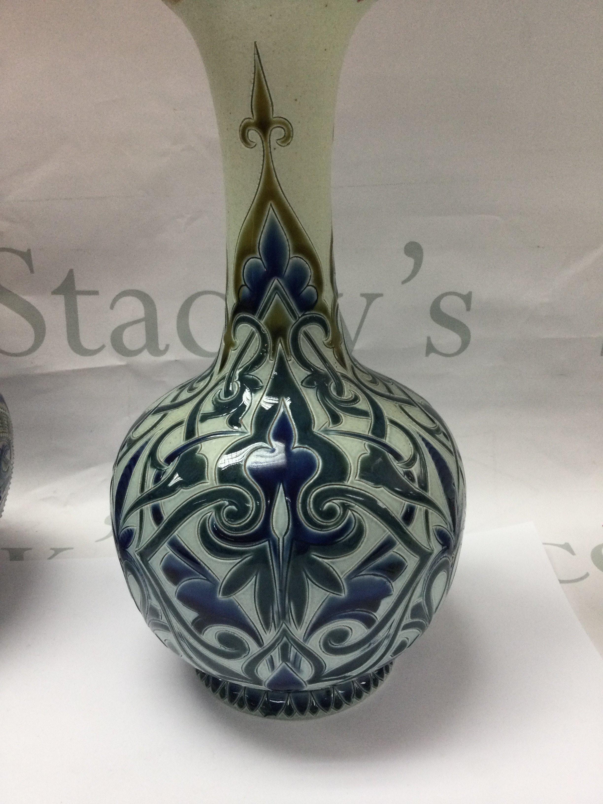 A Doulton Lambeth Edith Lupton vase decorated with floral design 26 cm .