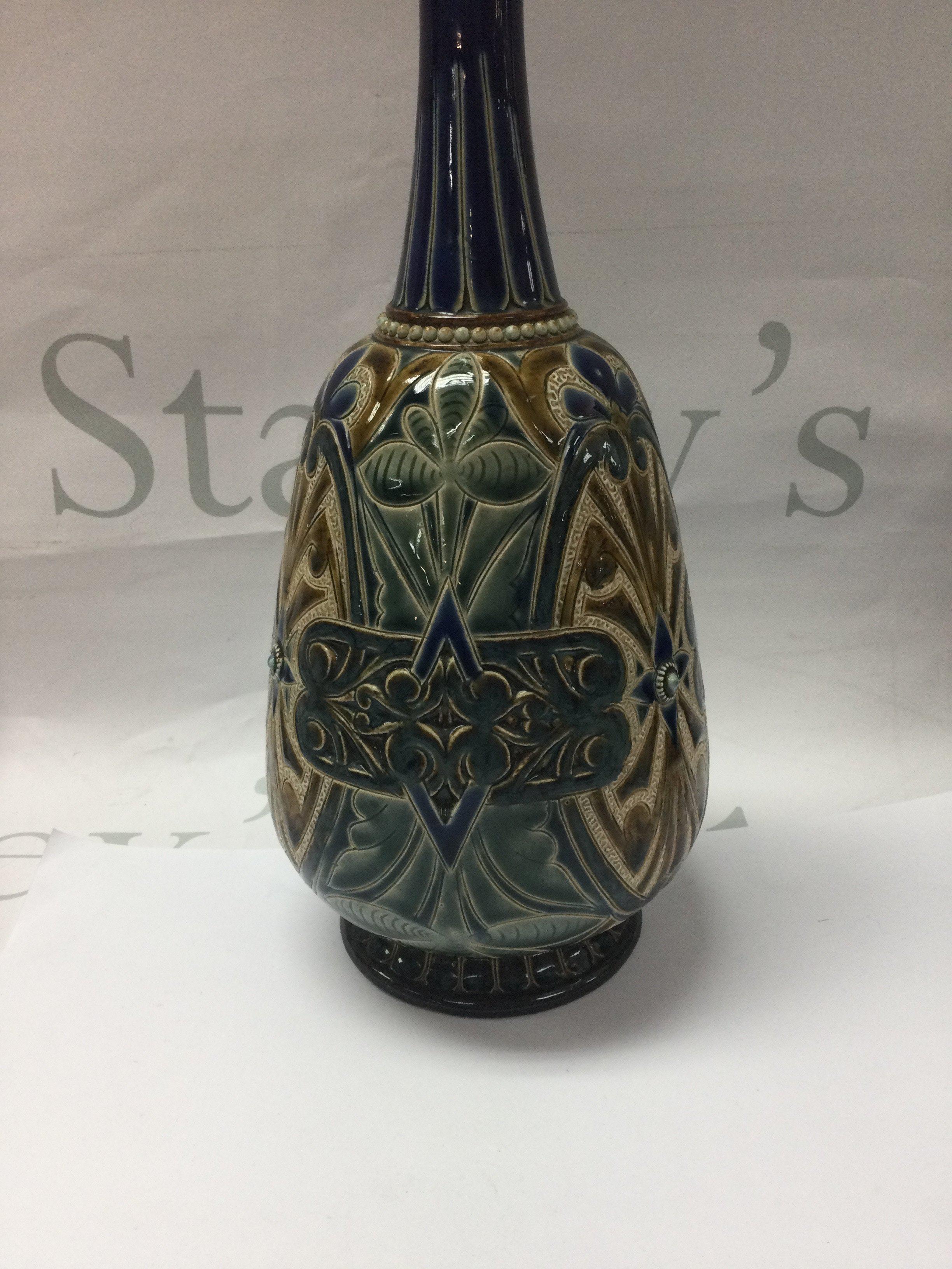 A Doulton Lambeth vase decorated by Edith Lupton with floral design 29 cm .