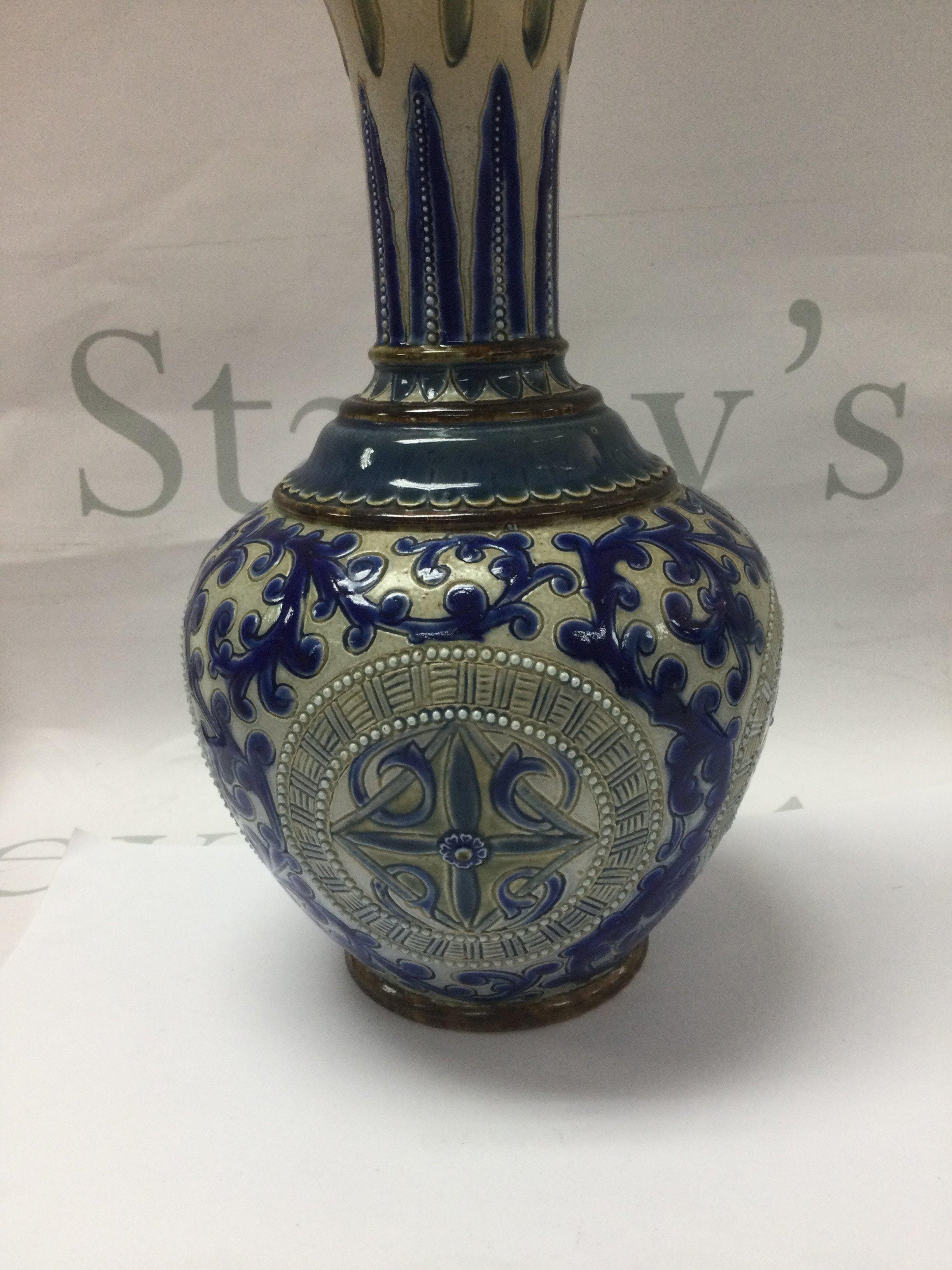 A Doulton Lambeth vase by Florence Barlow with scrolled decoration . 25 cm .