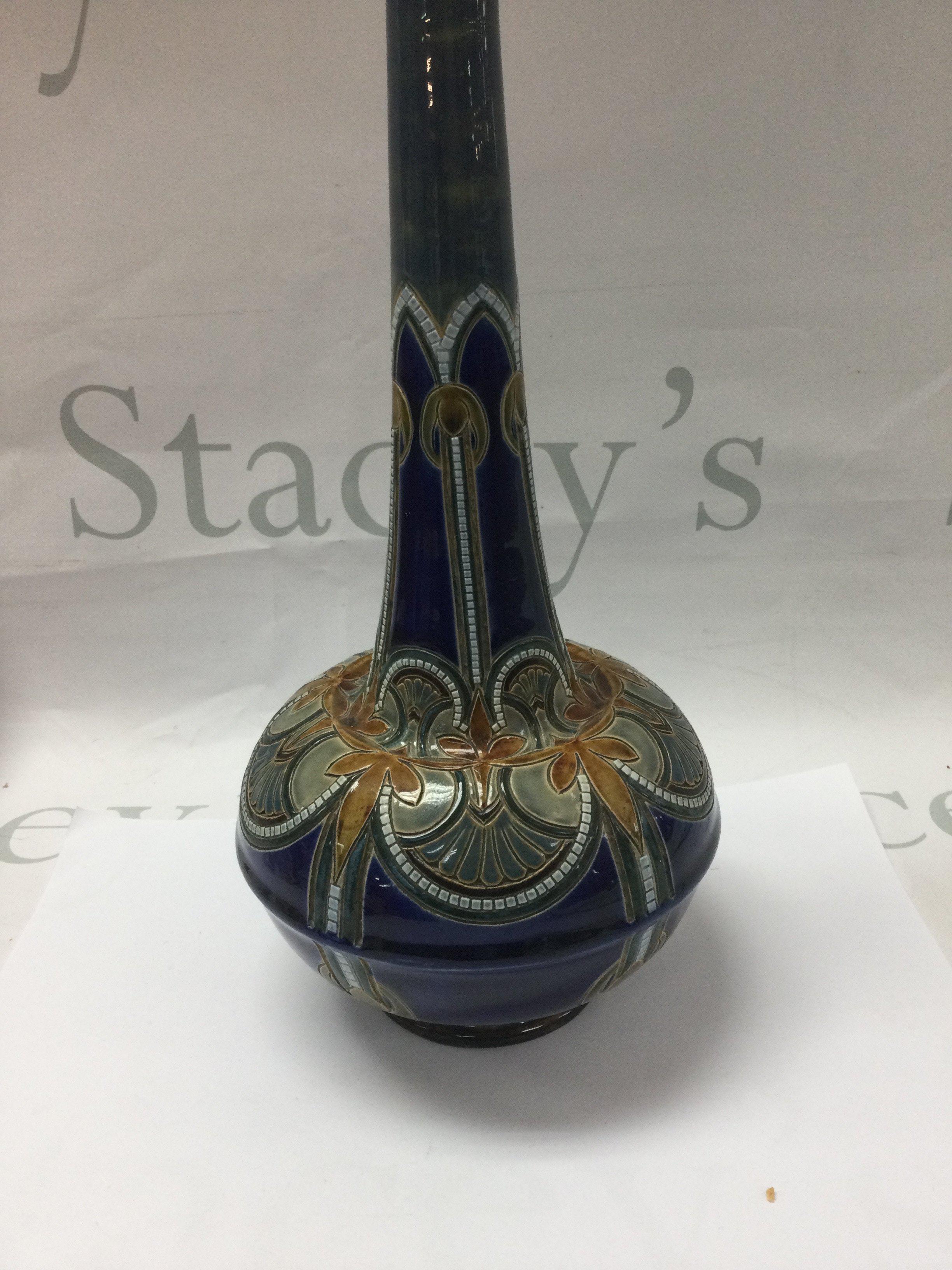 A Doulton Lambeth vase decorated by Edith Lupton 28 cm .