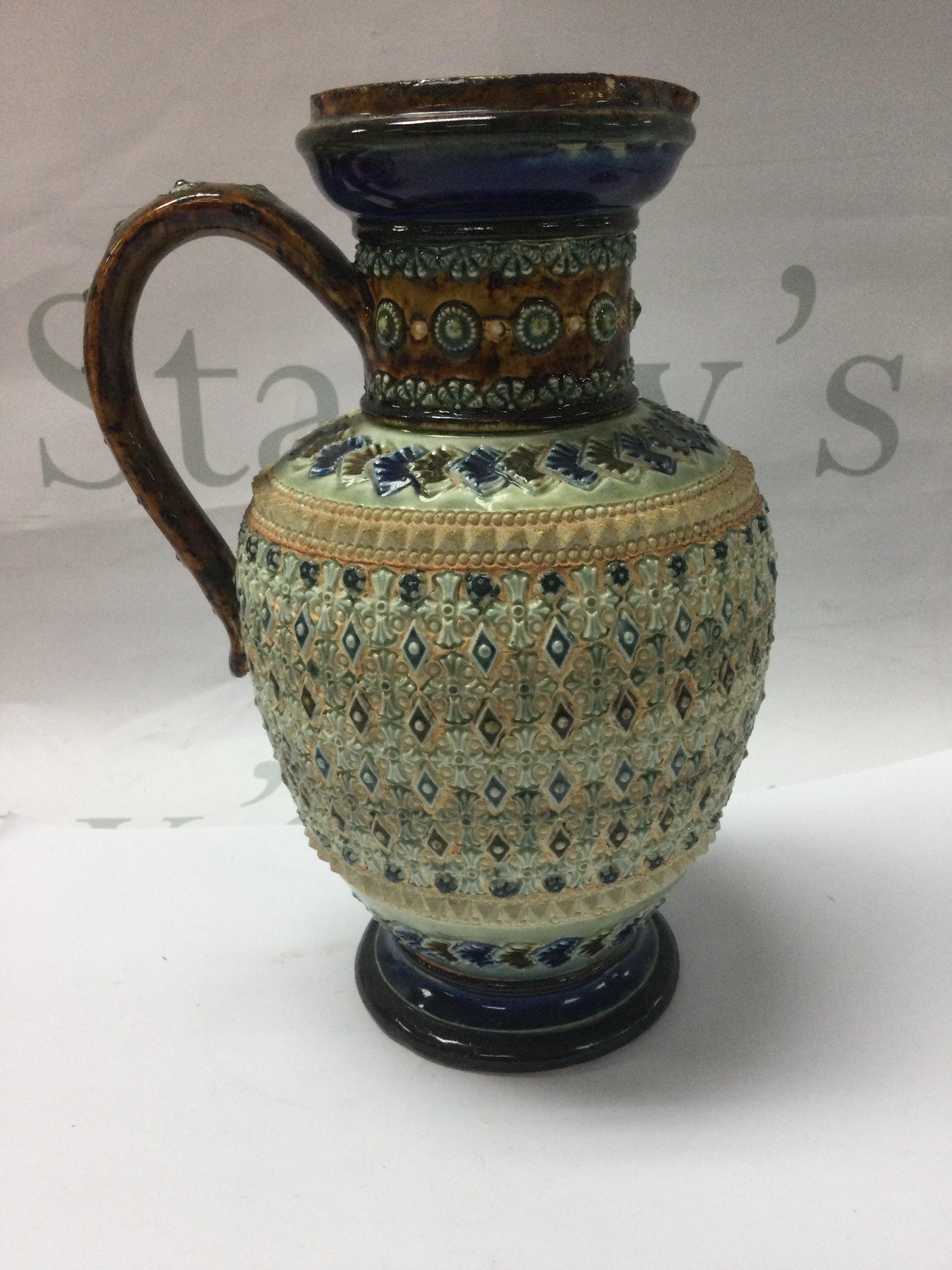 A Doulton Lambeth jug designed by Emily Partington