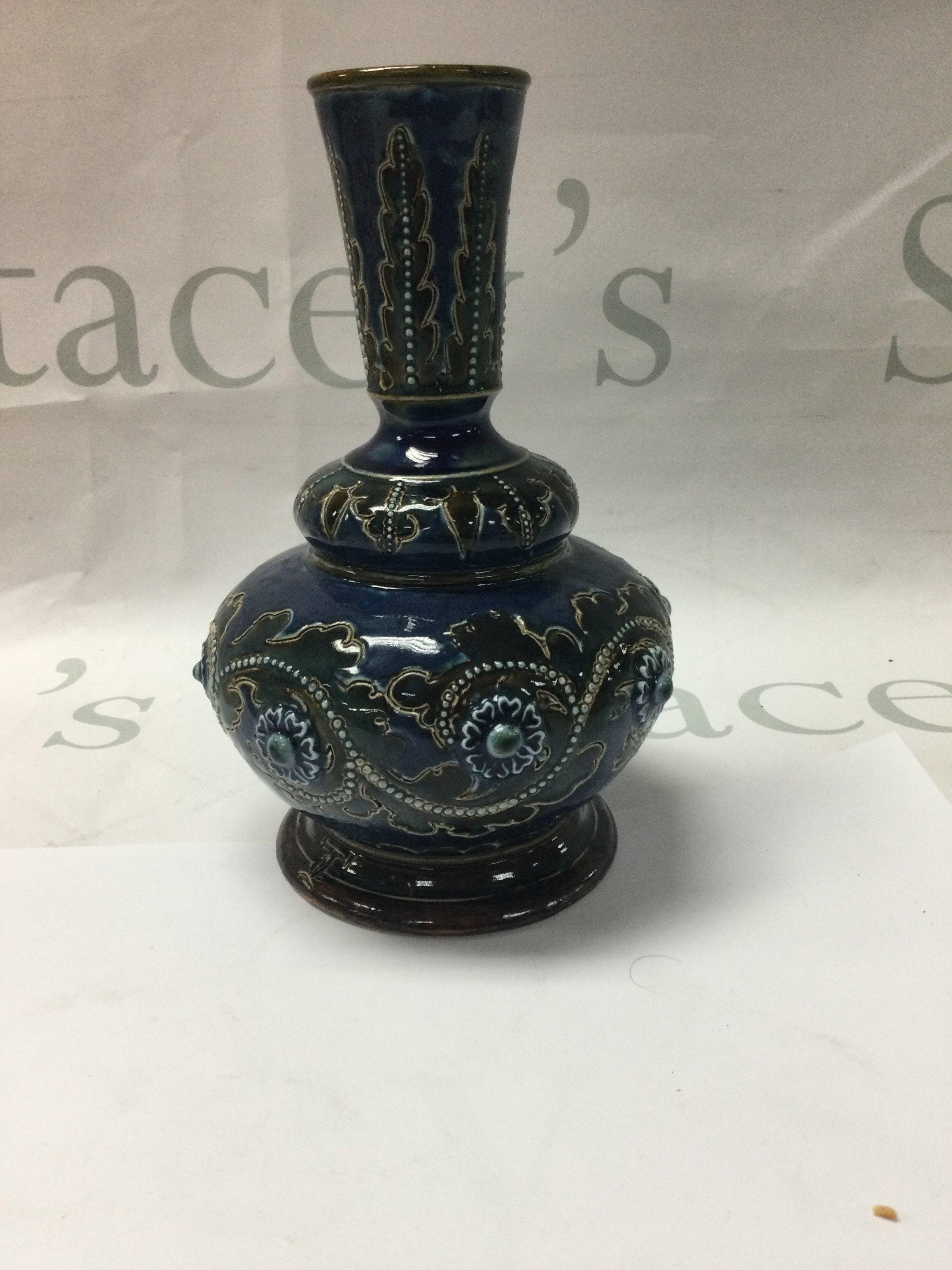 A Doulton Lambeth vase designed by George Tinworth .18 cm .