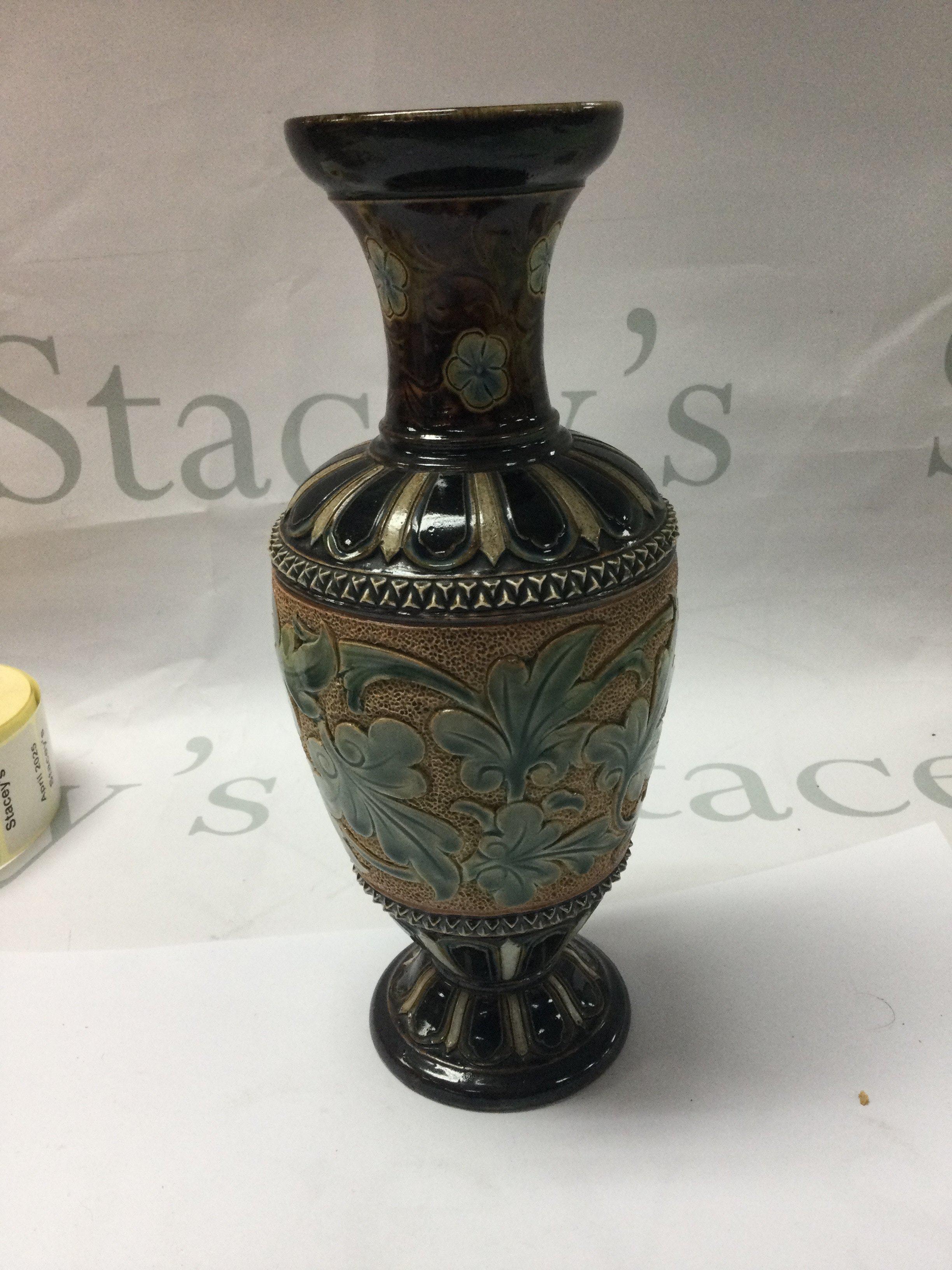 A Doulton Lambeth vases decorated with flowers and foliage 22 cm