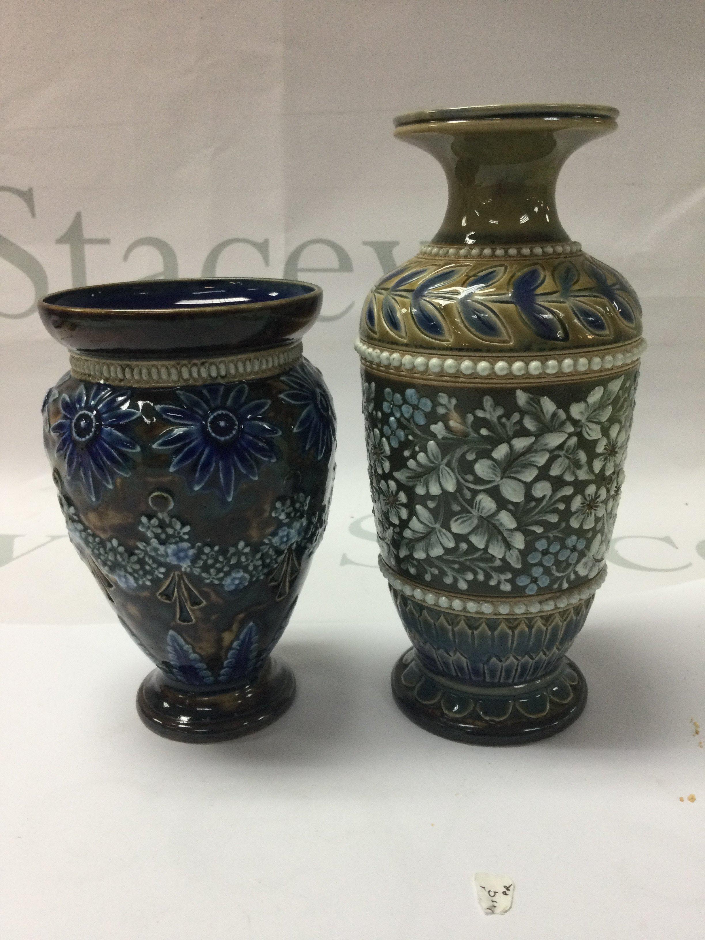 Two Doulton Lambeth vases decorated with flowers and foliage including Edith Lupton design. 17 cm and 12 cm
