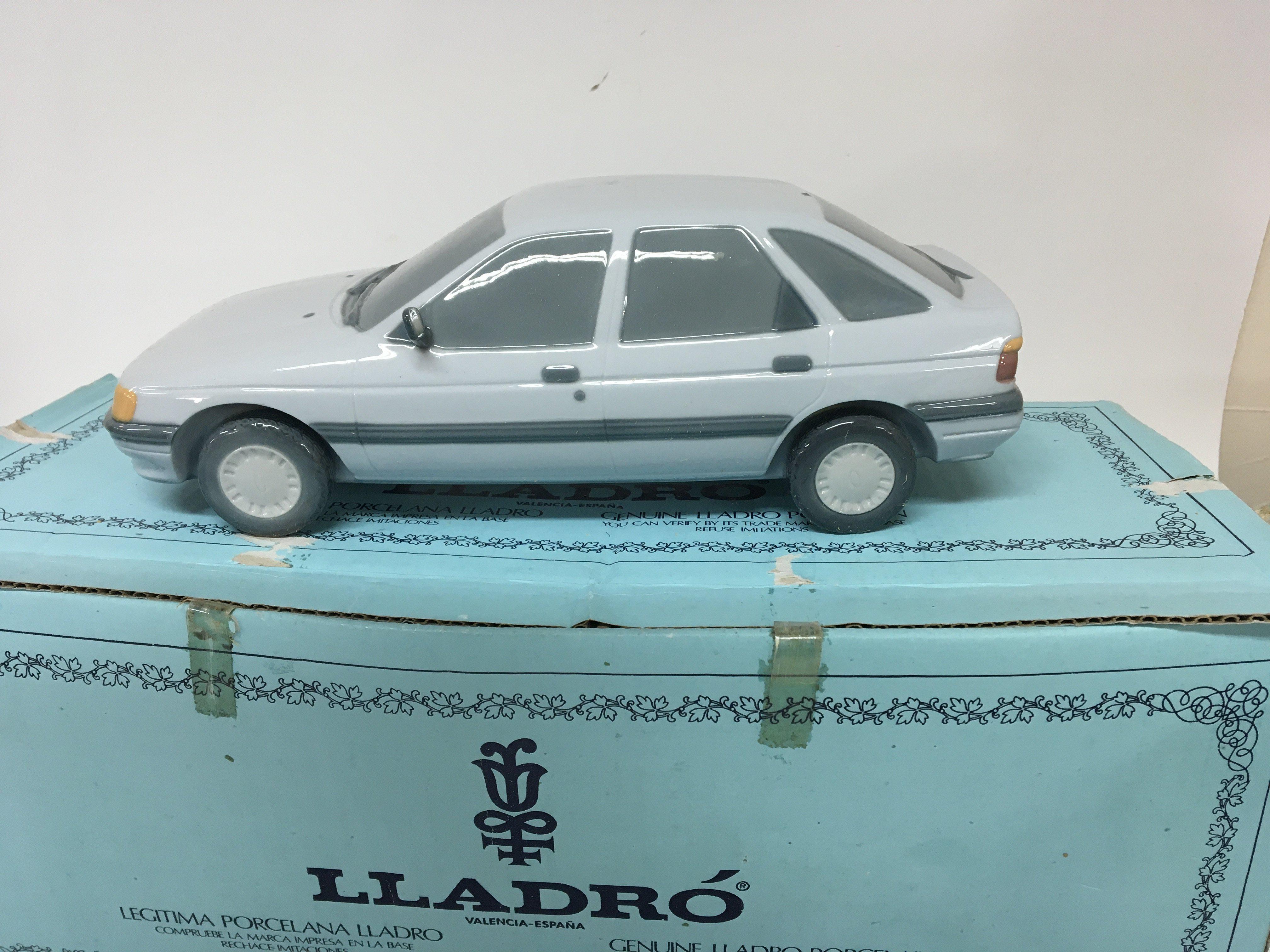 A Lladro Model of a 1990 Ford Escort car with box no damage.