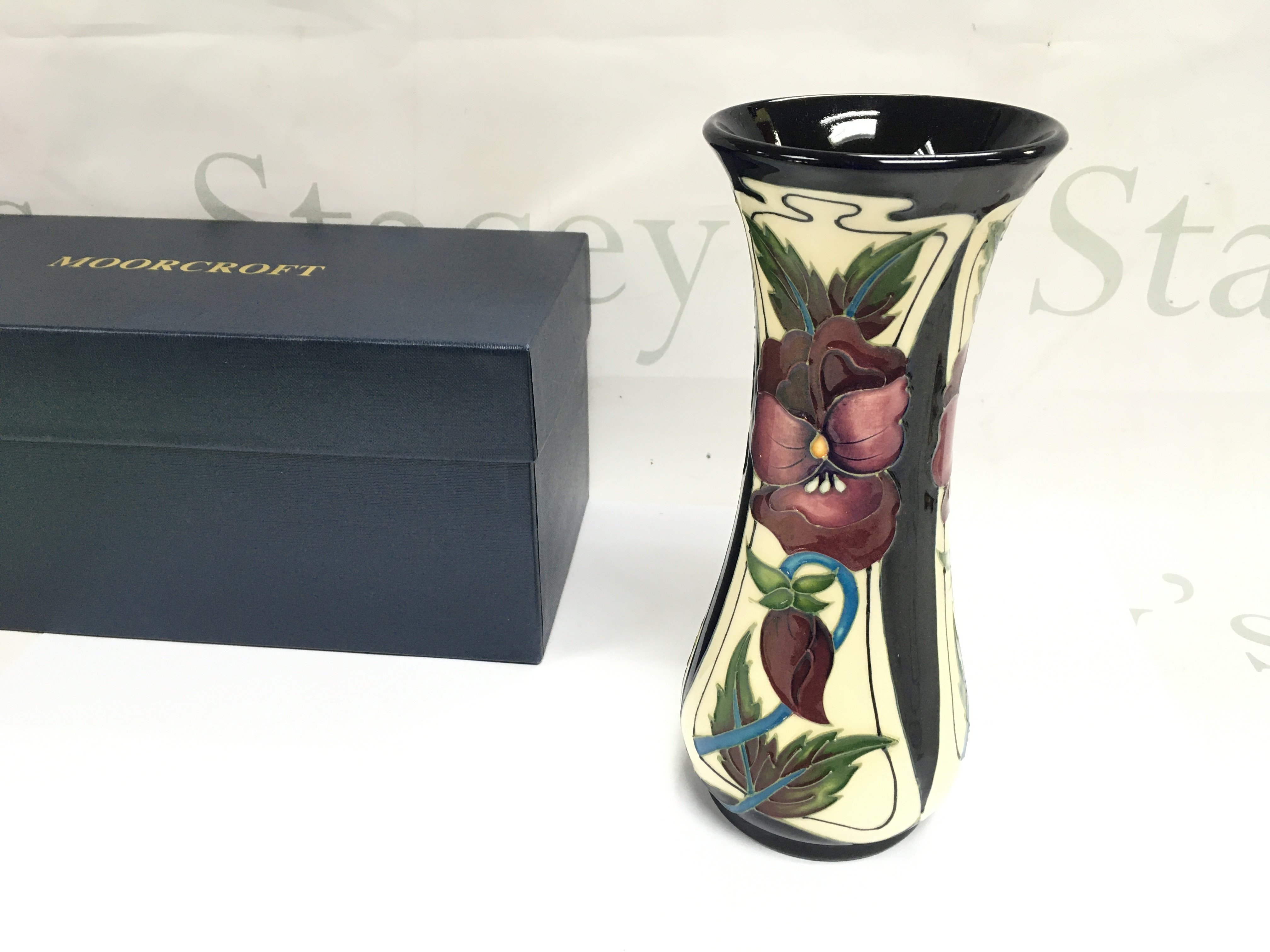 A boxed moorcroft limited edition vase. 21cm tall.